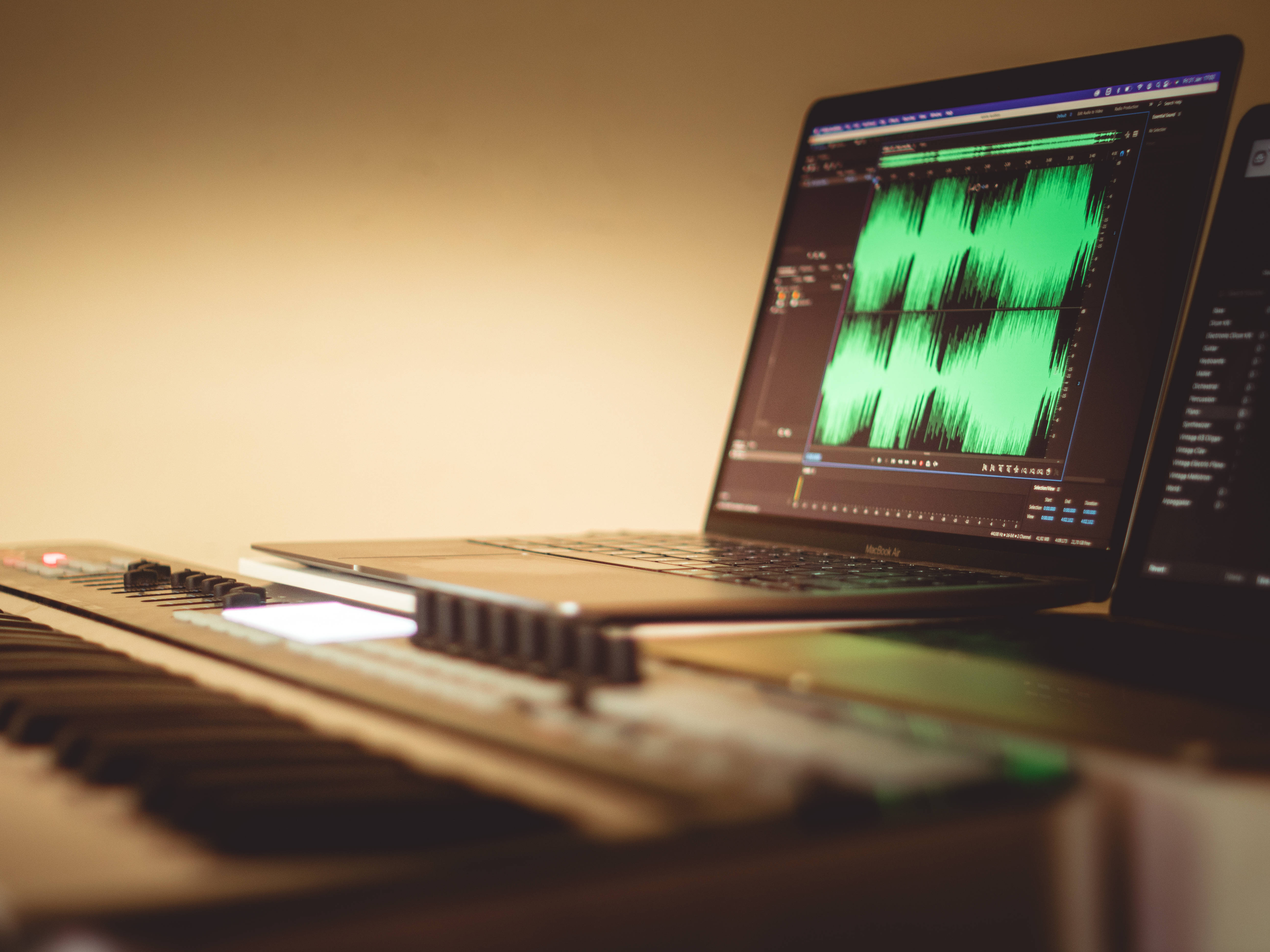 laptop, audio editing software, vibrant green audio waveforms, 5K Desktop Wallpaper