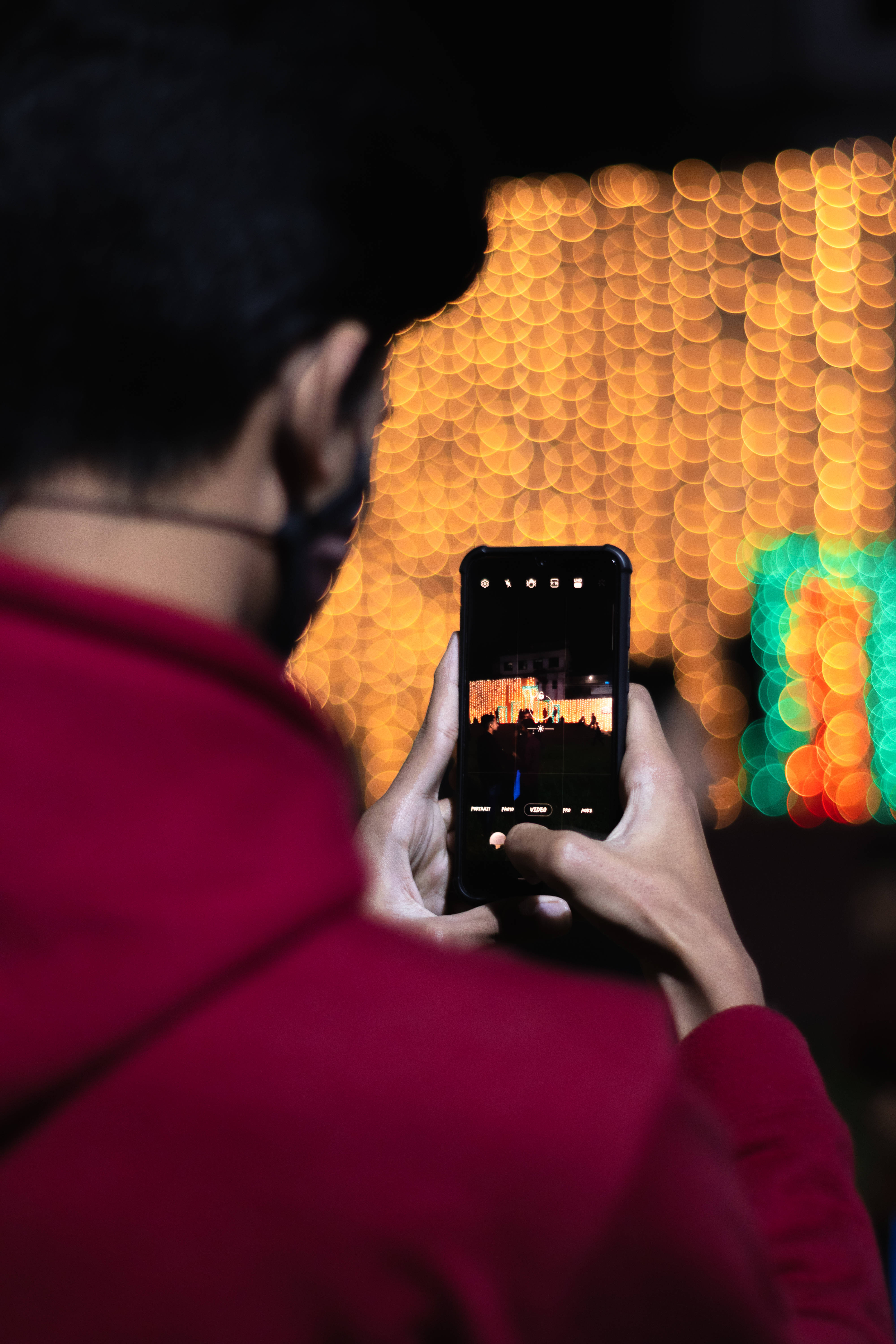 red hoodie, vibrant bokeh, golden and green lights, 5K Phone Wallpaper