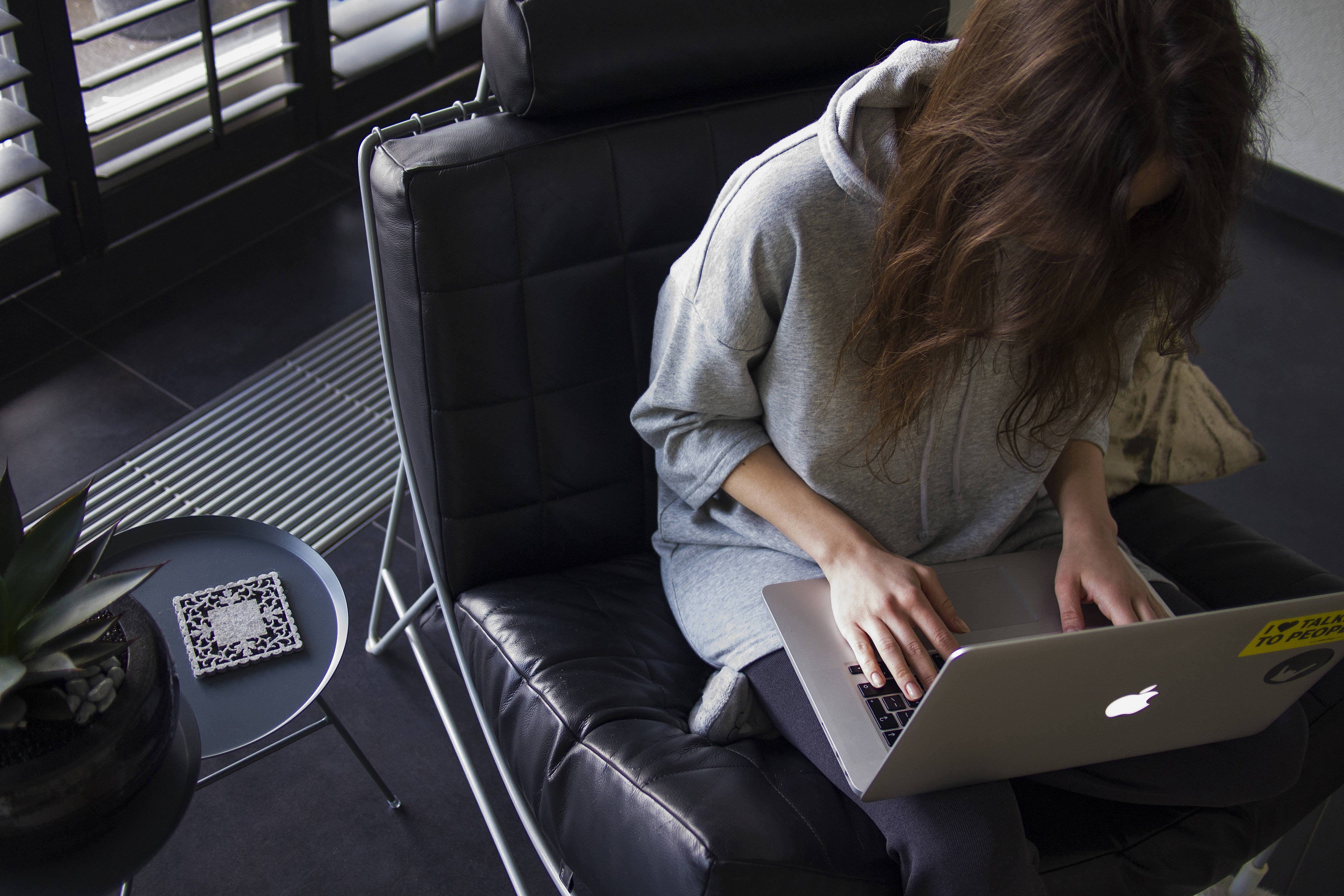 laptop, gray hoodie, black leather chair, 4K Desktop Wallpaper