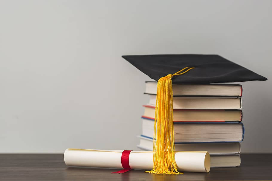 graduation cap, golden tassel, stack of books, SD Desktop Wallpaper