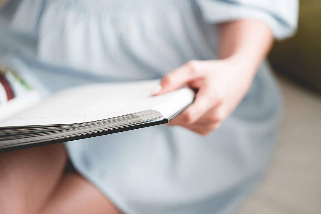 light blue striped dress, open book, focused hand, SD Desktop Wallpaper