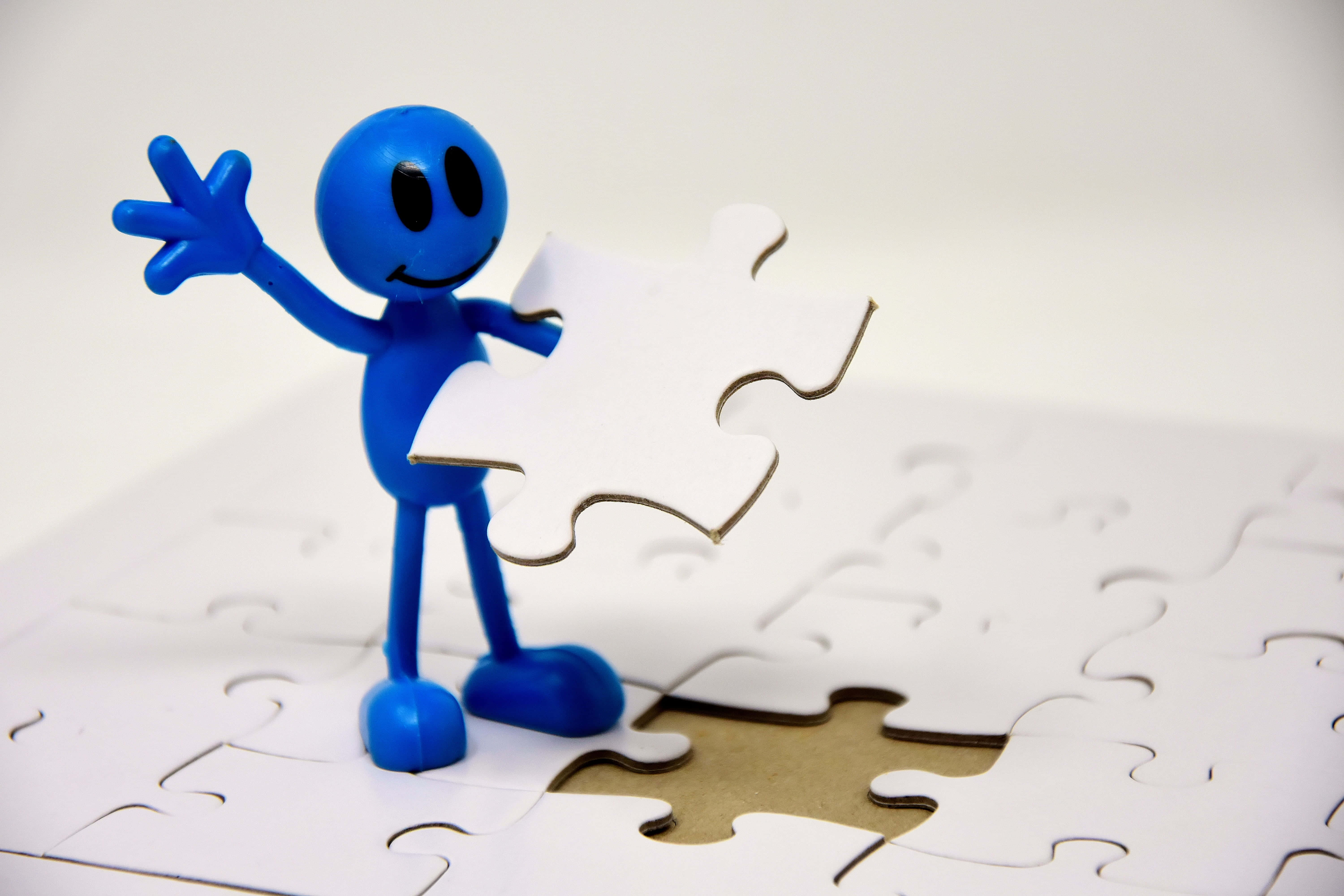 educational games, blue smiling figurine, puzzle piece, 5K Desktop Wallpaper
