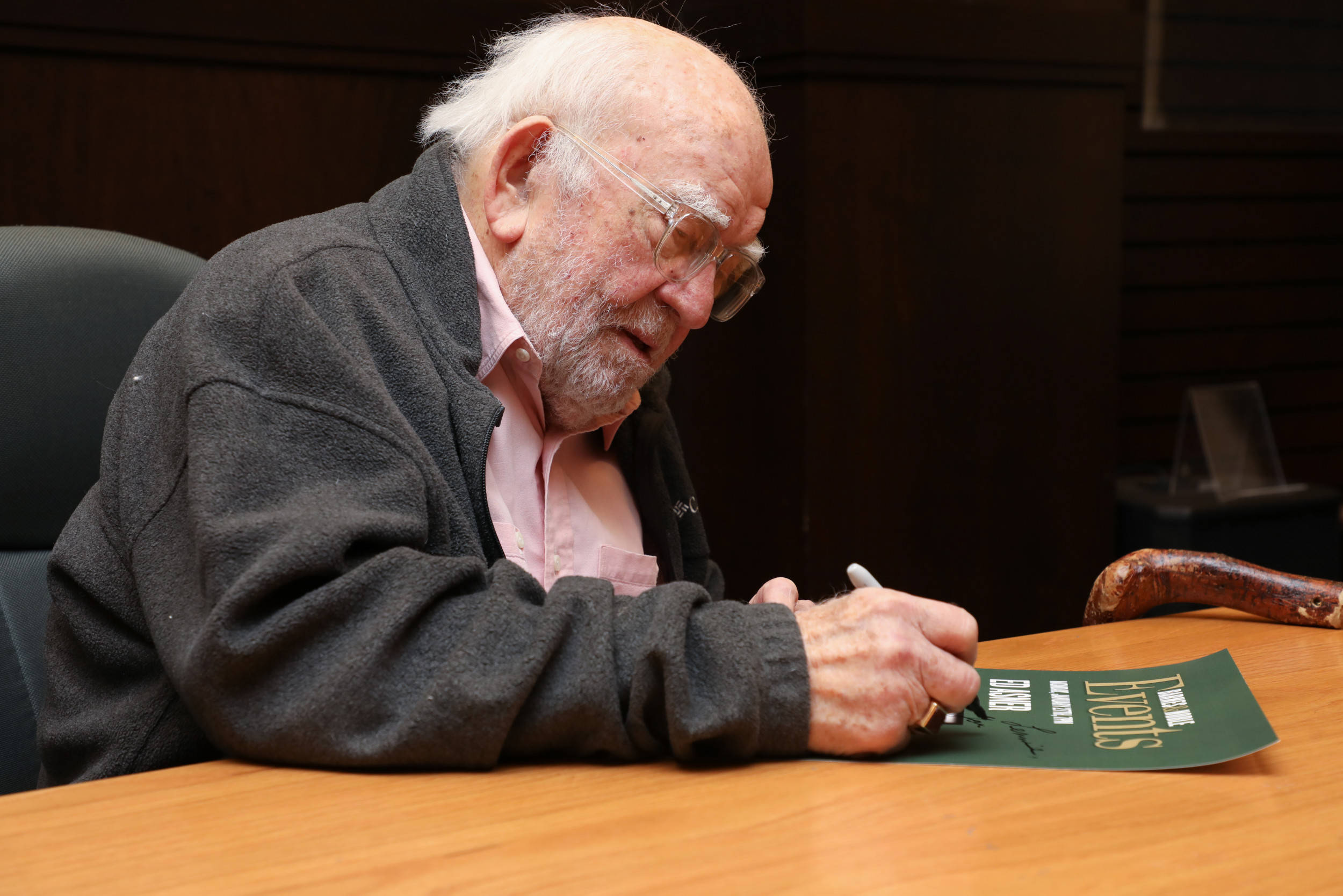 Edward Asner, green booklet, wooden table, Full HD Desktop Wallpaper