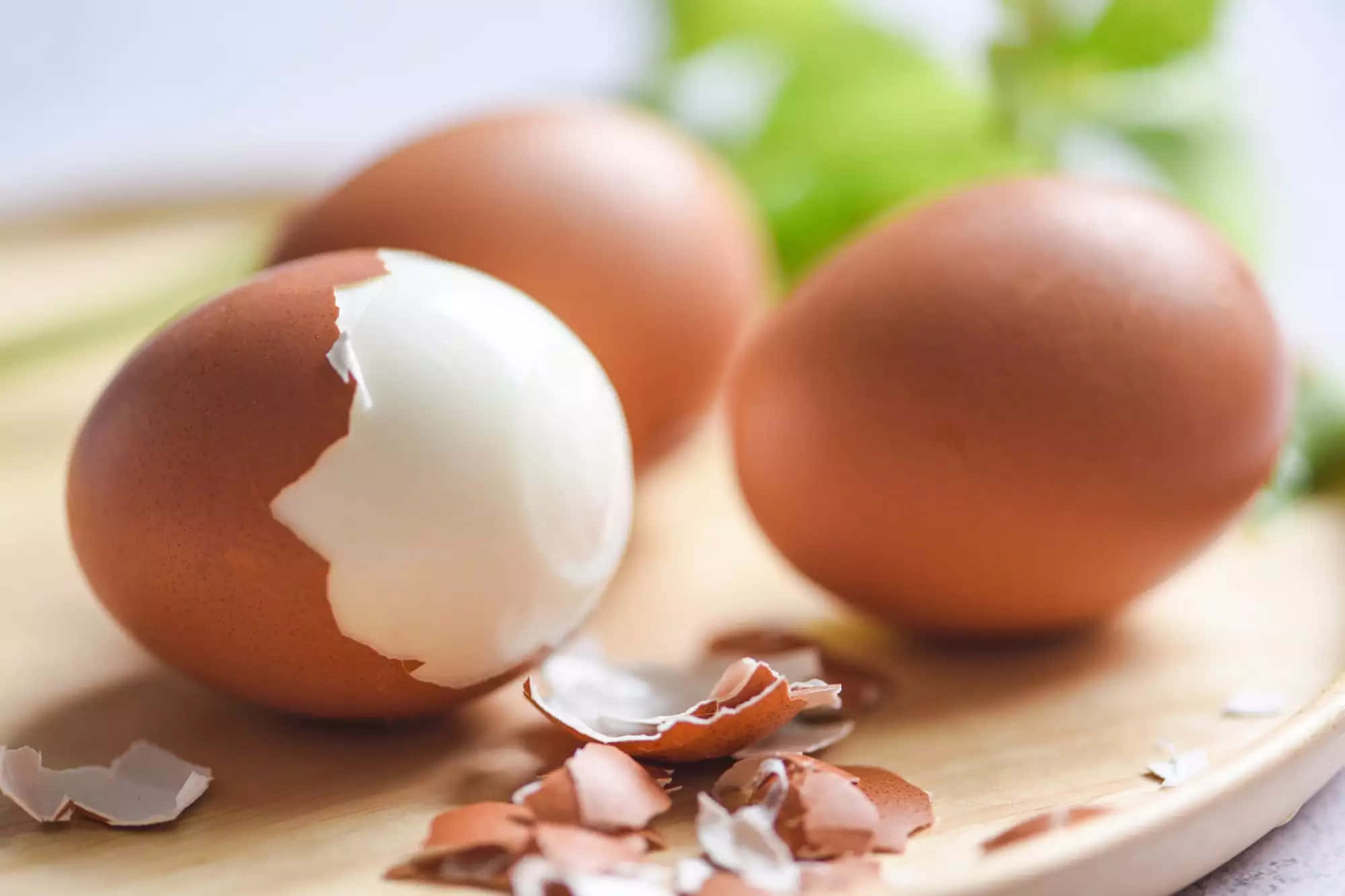 peeled oval brown egg, white interior, wooden board, Full HD Desktop Wallpaper