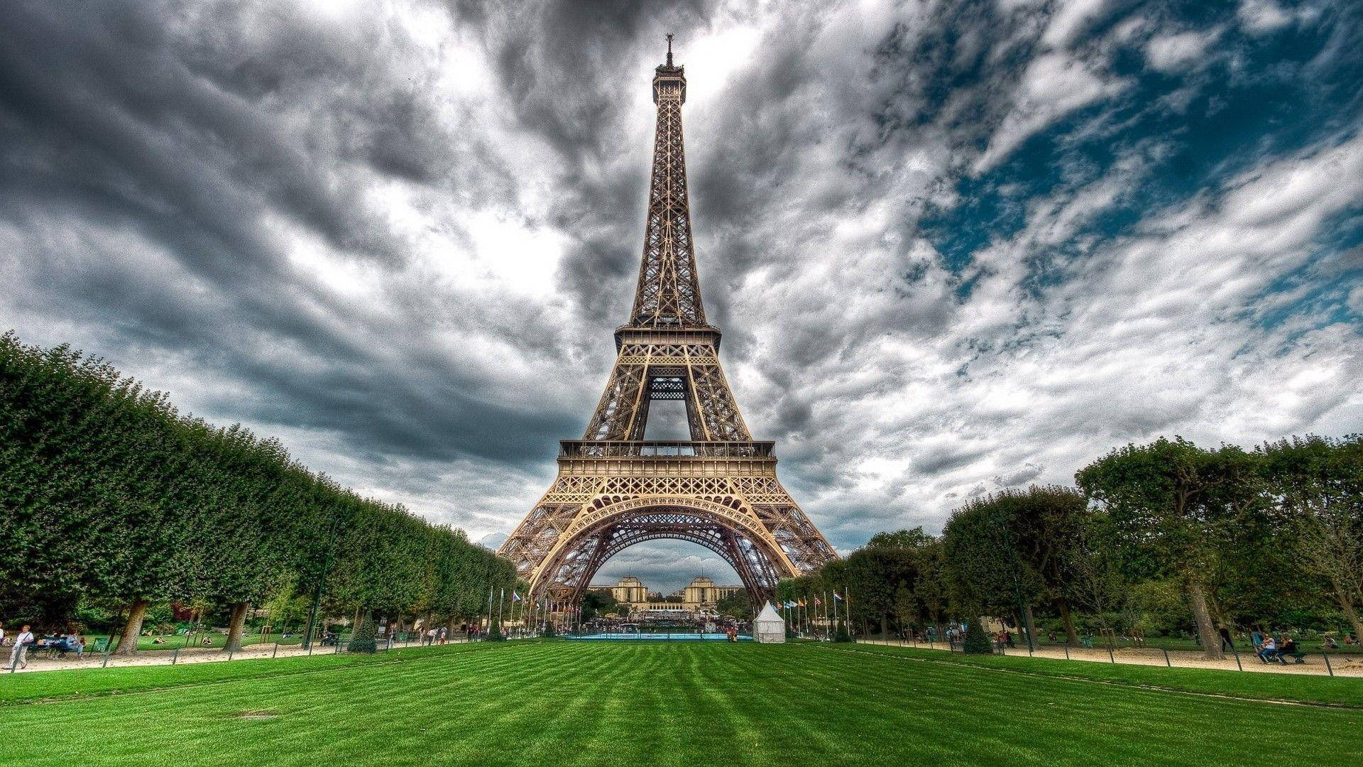Eiffel Tower, cloudy sky, vibrant green lawns, Full HD Desktop Wallpaper