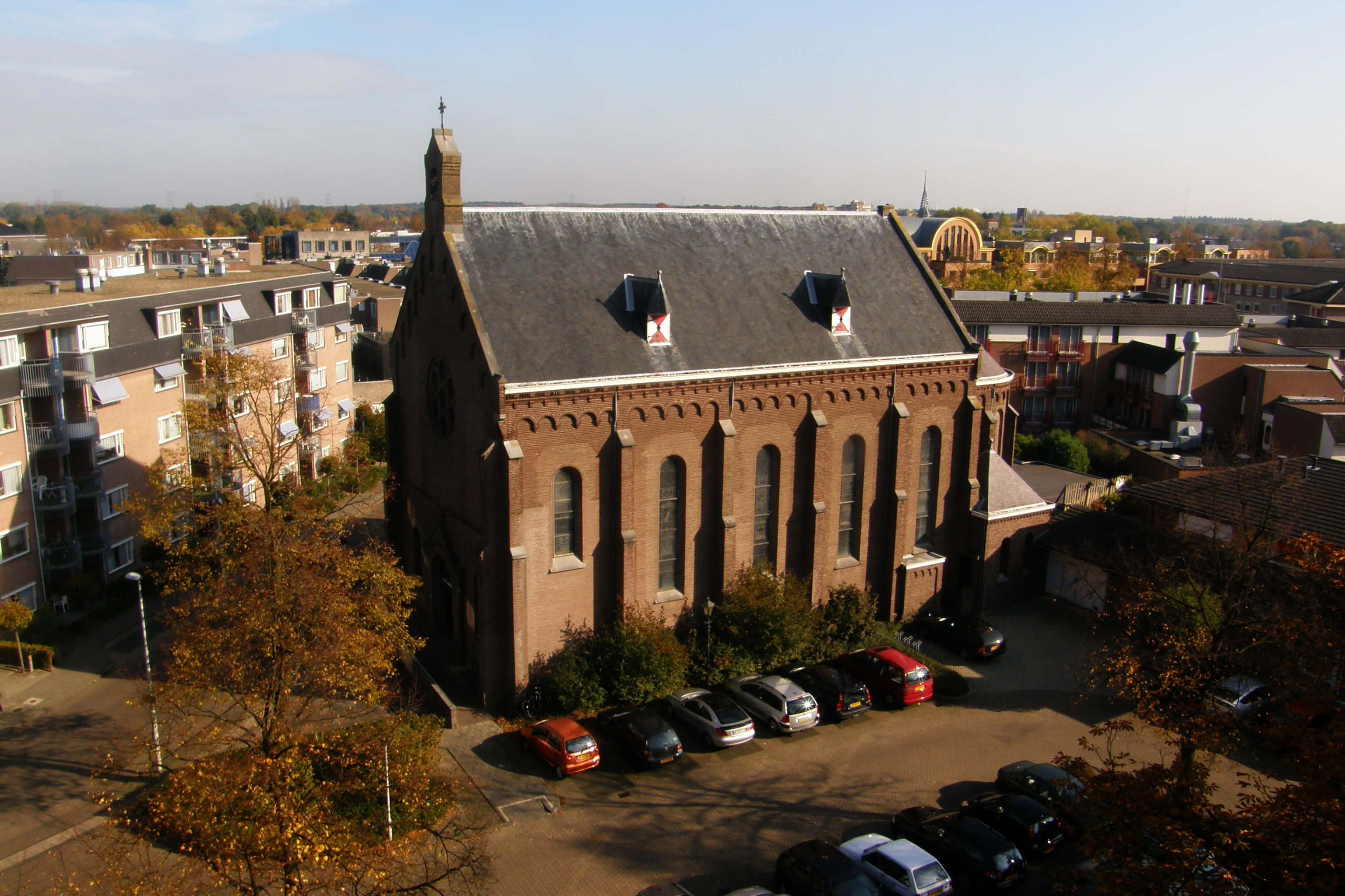 Eindhoven, red brick church, steep gabled roof, 2K Desktop Wallpaper