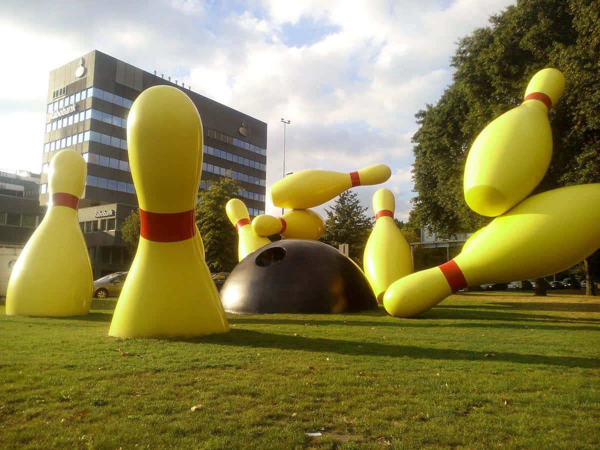 Eindhoven, giant yellow bowling pins, black ball, SD Desktop Wallpaper