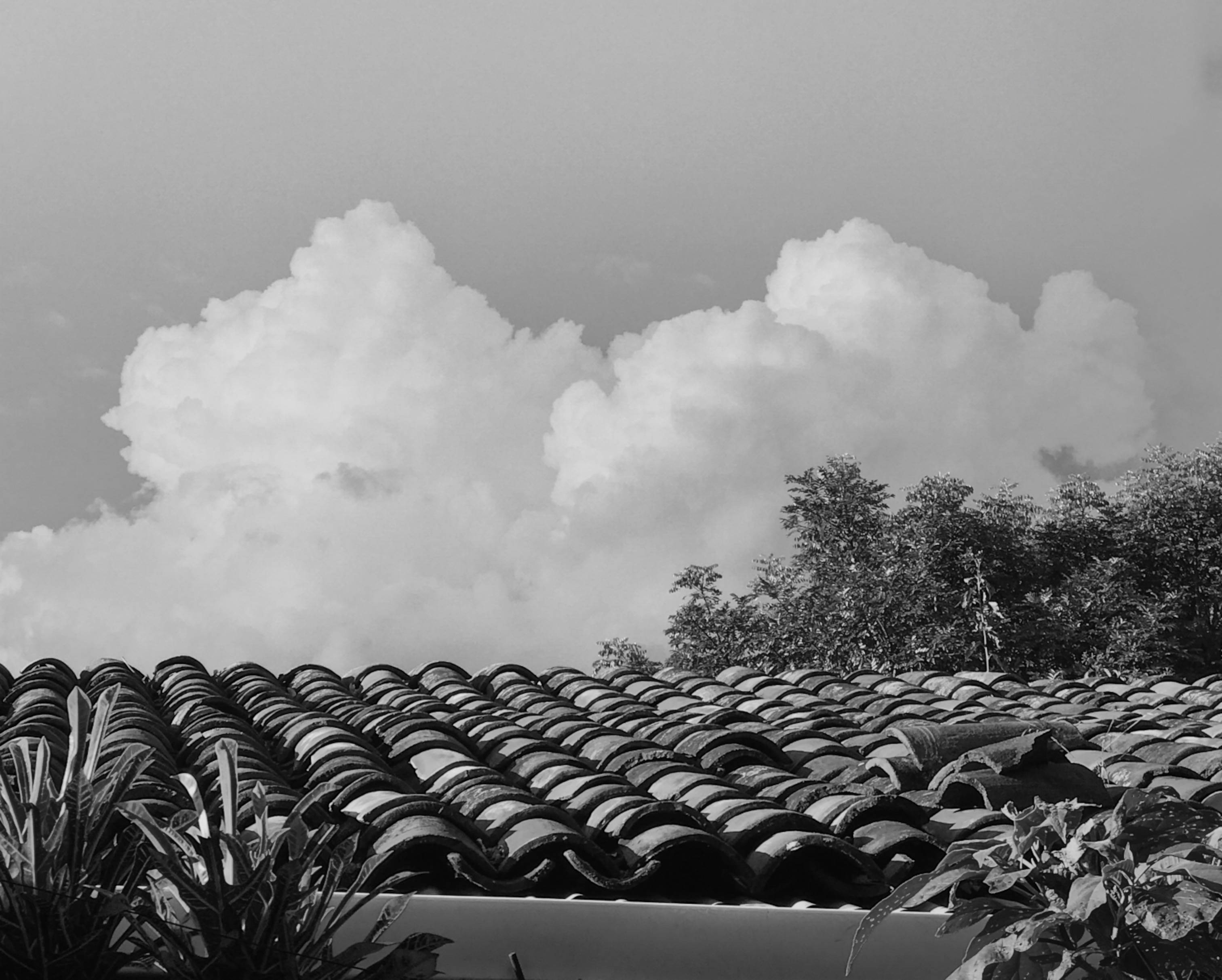 El Salvador, stormy sky, textured clay roof tiles, 2K Desktop Wallpaper
