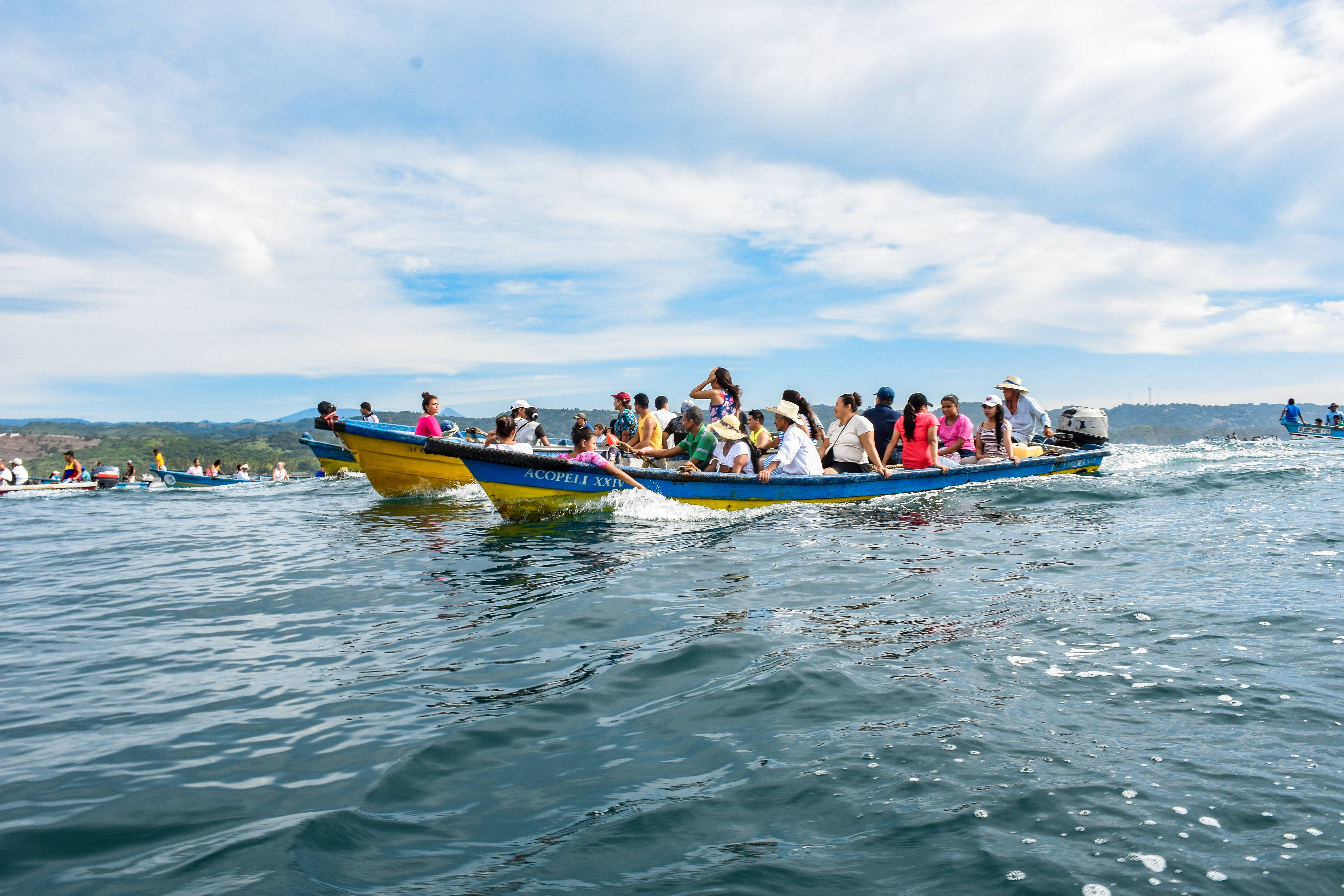 El Salvador, port procession, vibrant blue and yellow motorboat, 5K Desktop Wallpaper