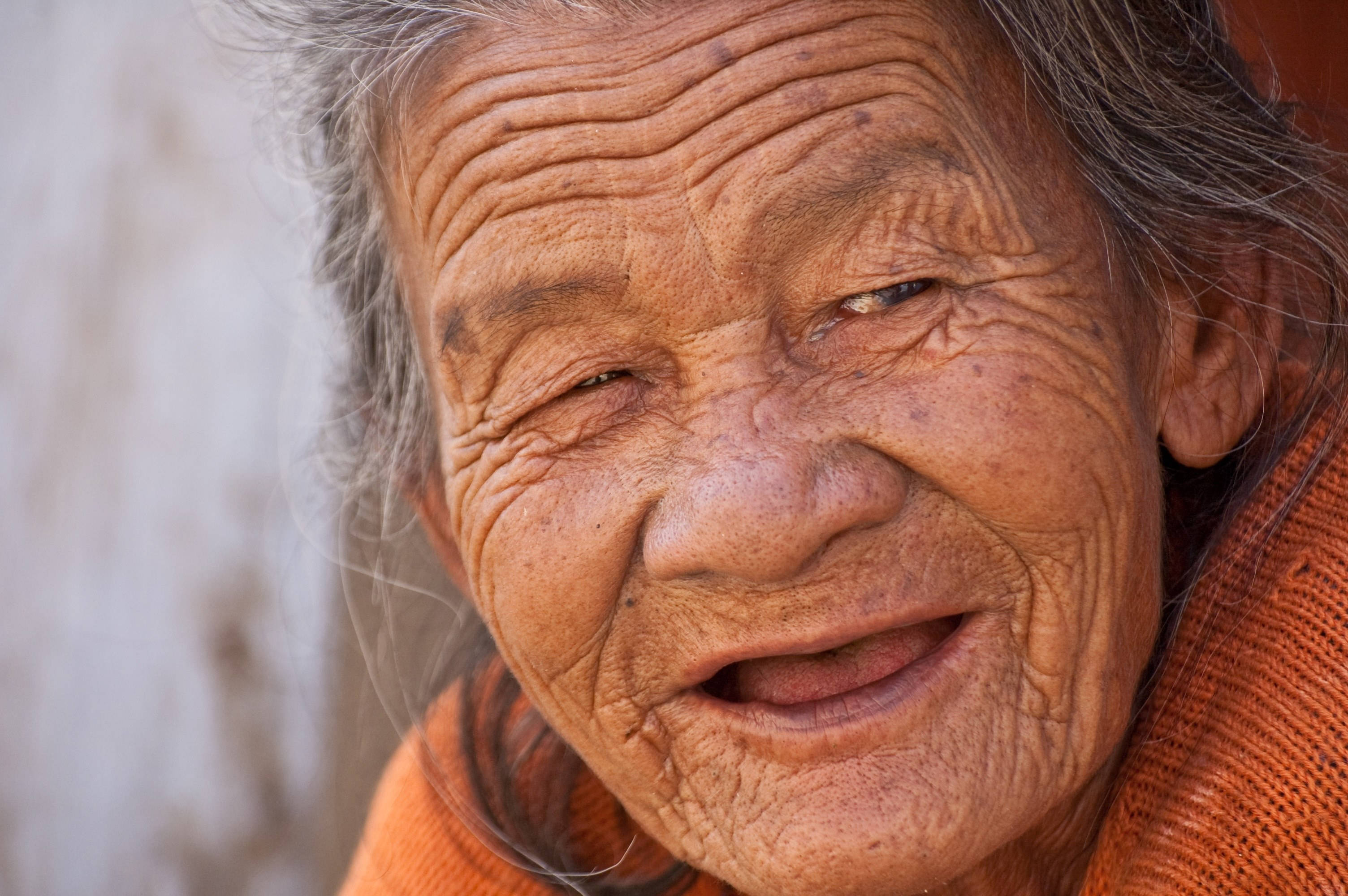 elderly woman, big smile, deep wrinkled skin, 2K Desktop Wallpaper