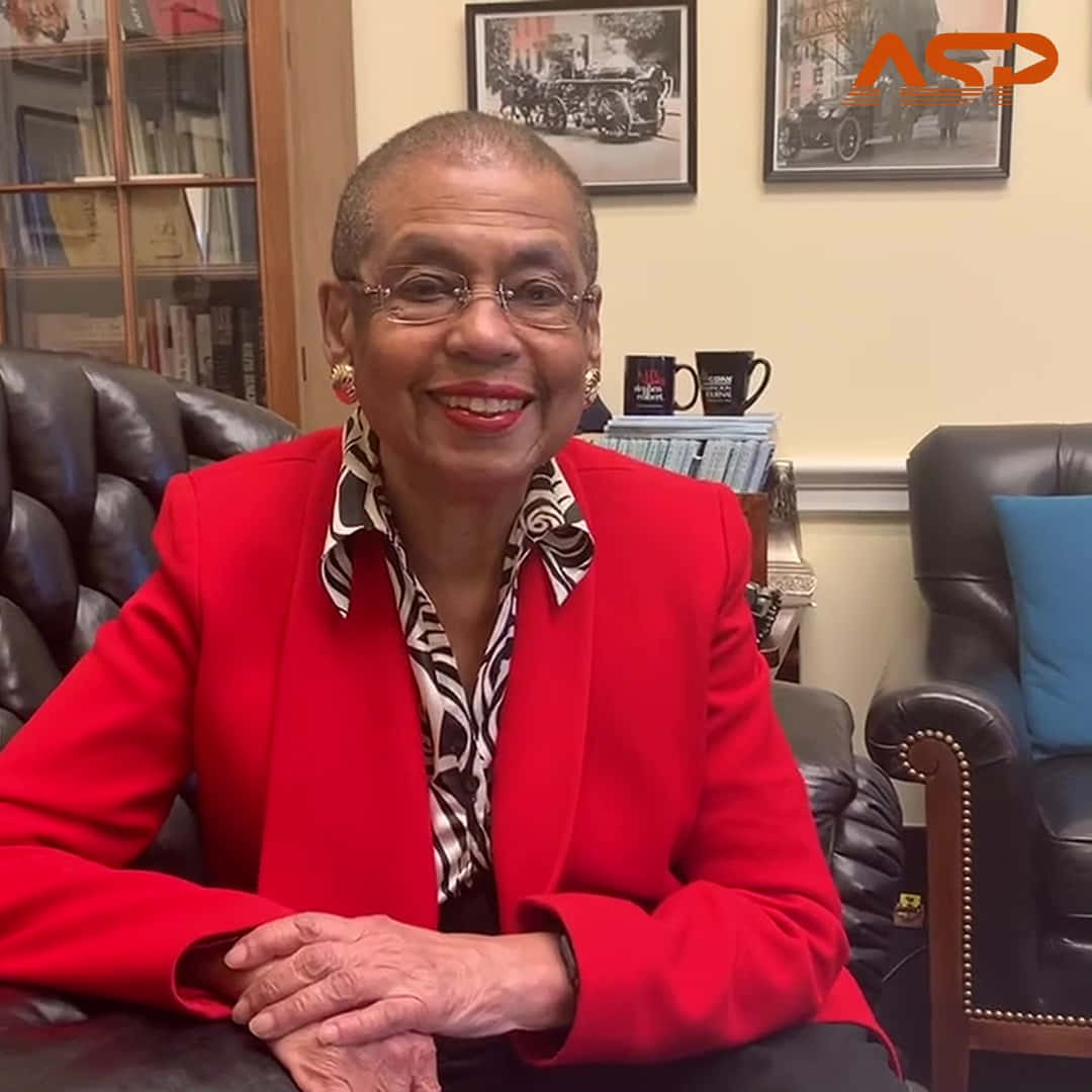 Eleanor Holmes Norton, red blazer, leather chair, SD Desktop Wallpaper