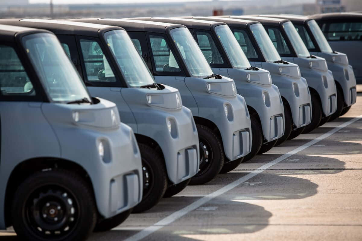 light gray, compact electric cars, sunlit asphalt lot, SD Desktop Wallpaper