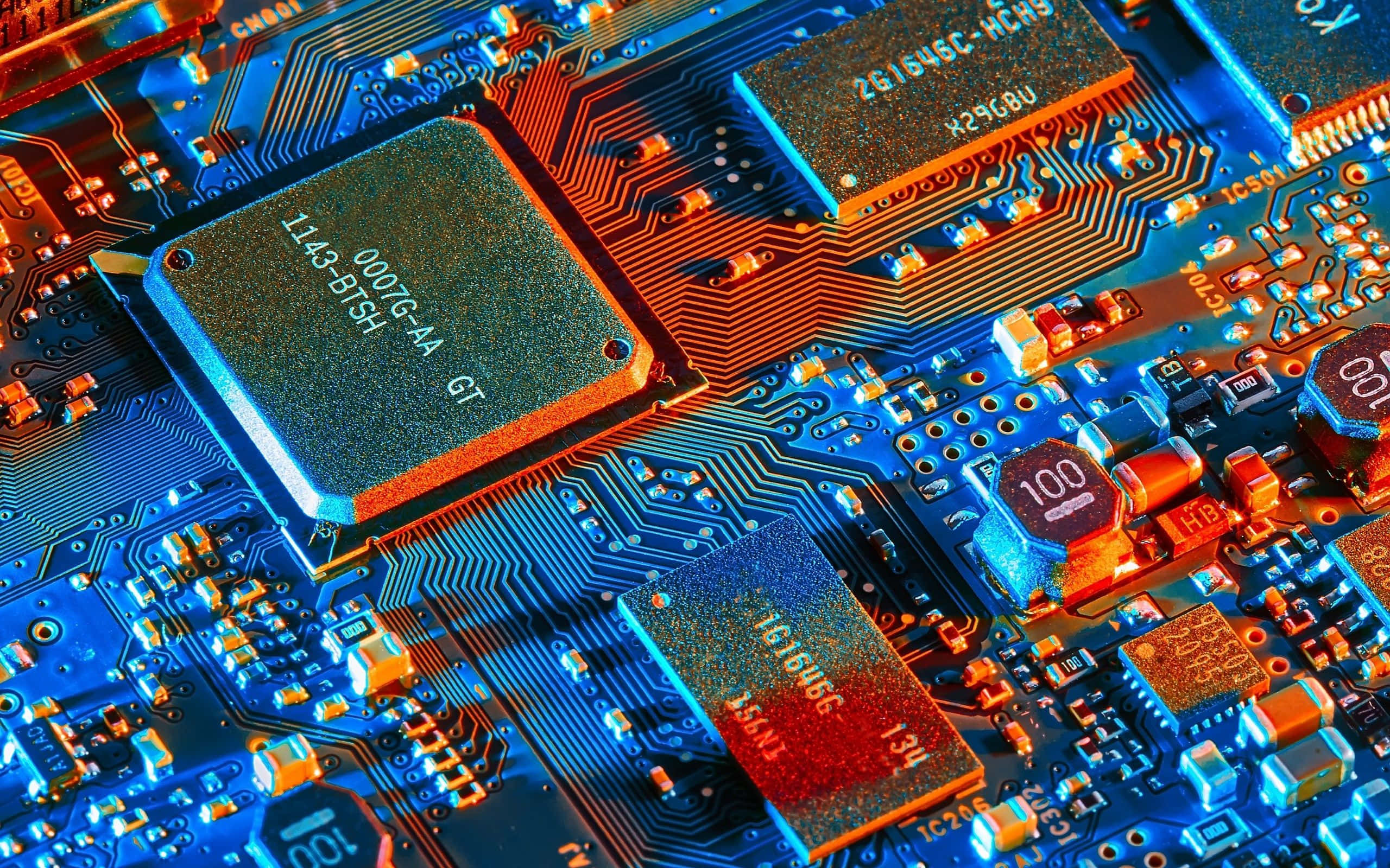 vibrant blue circuit board, glowing orange and red components, dramatic lighting, 2K Desktop Wallpaper