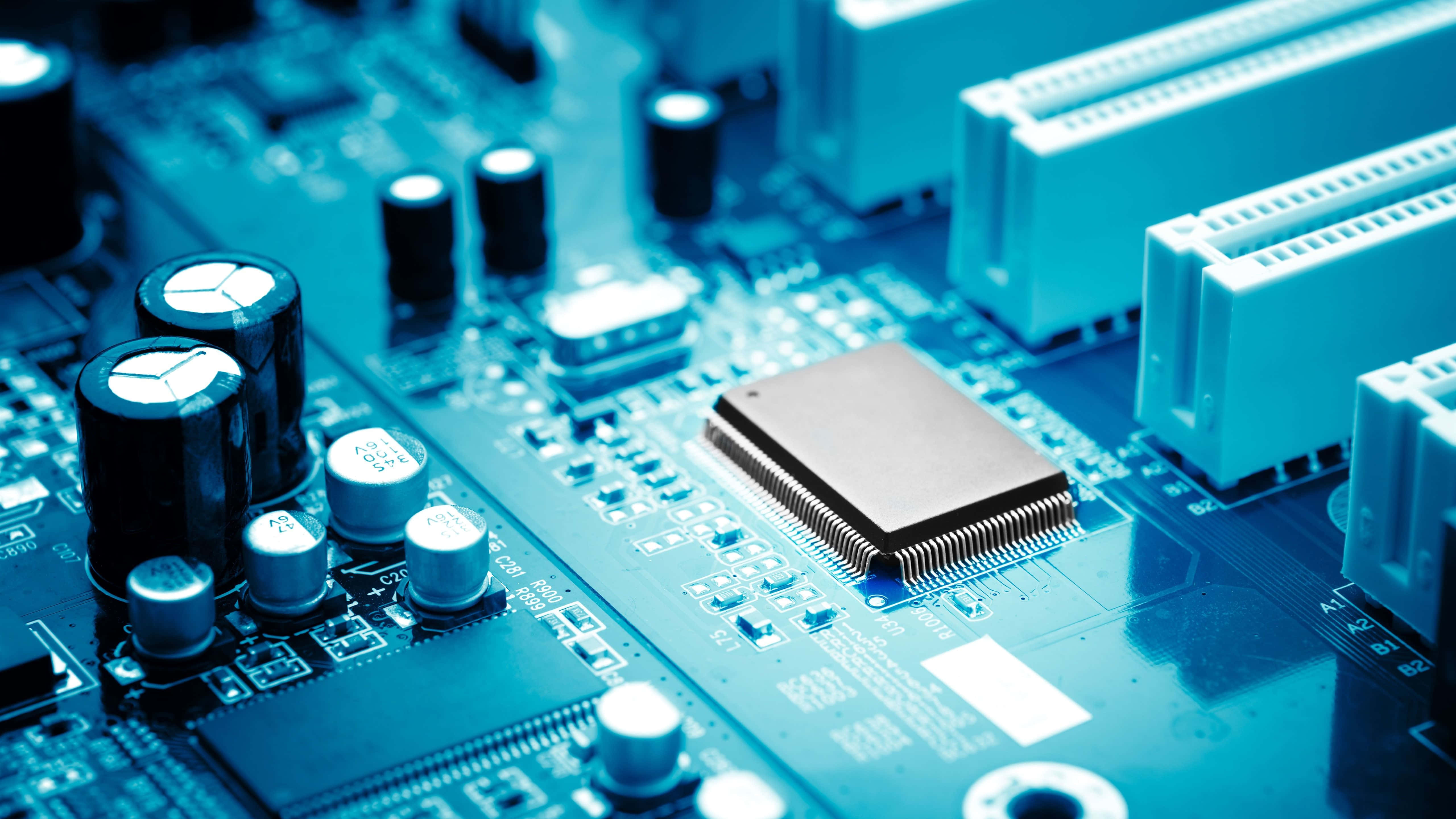 blue-tinted computer motherboard, capacitors, chip components, 5K Desktop Wallpaper