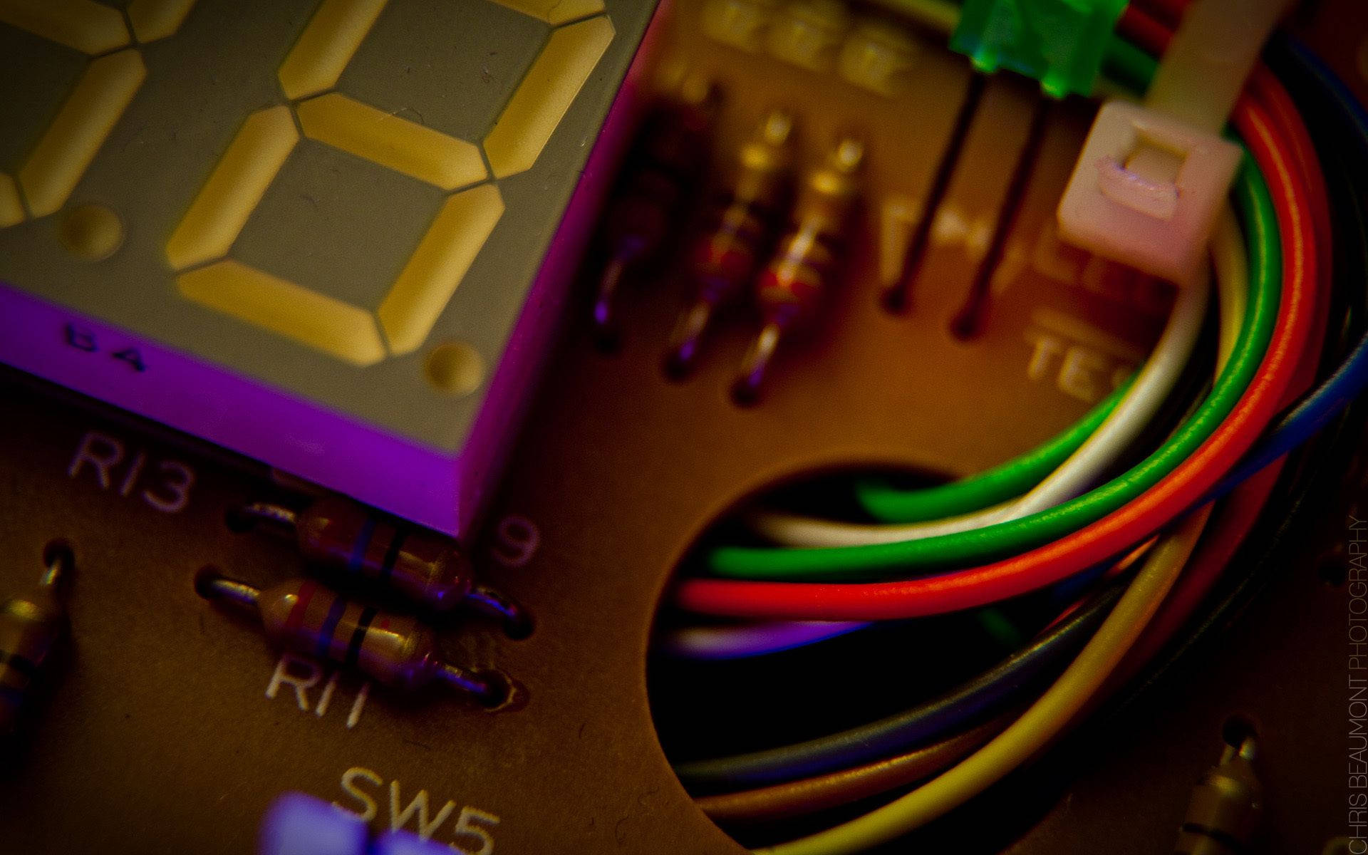 circuit board, glowing yellow digital display, colorful wires, Full HD Desktop Wallpaper