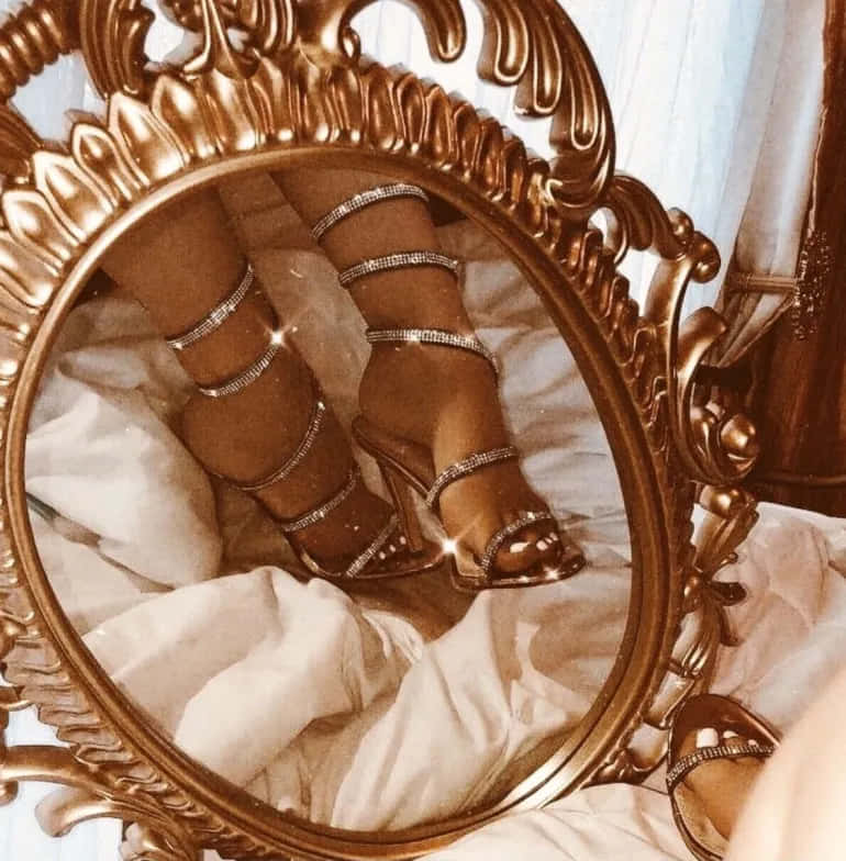 ornate gold mirror frame, sparkling strappy heels, white bedding, SD Phone Wallpaper