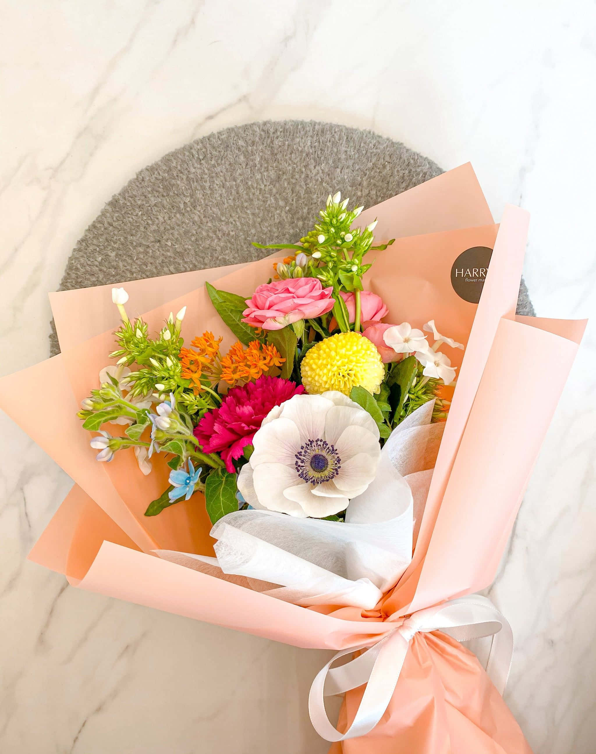 floral arrangement, pink orange and white flowers, peach paper, 2K Phone Wallpaper