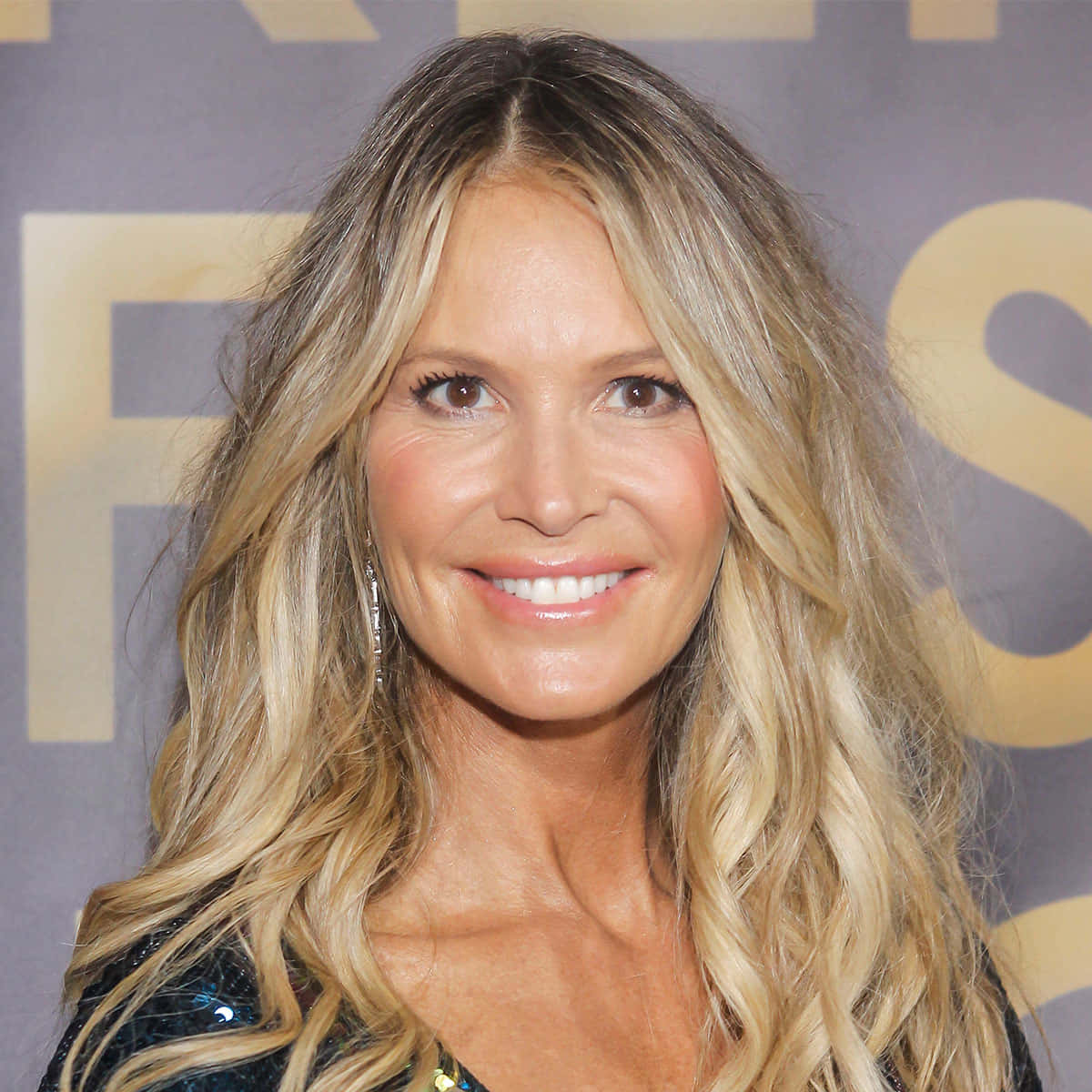 Elle Macpherson, long wavy blonde hair, sparkling earrings, SD Desktop Wallpaper