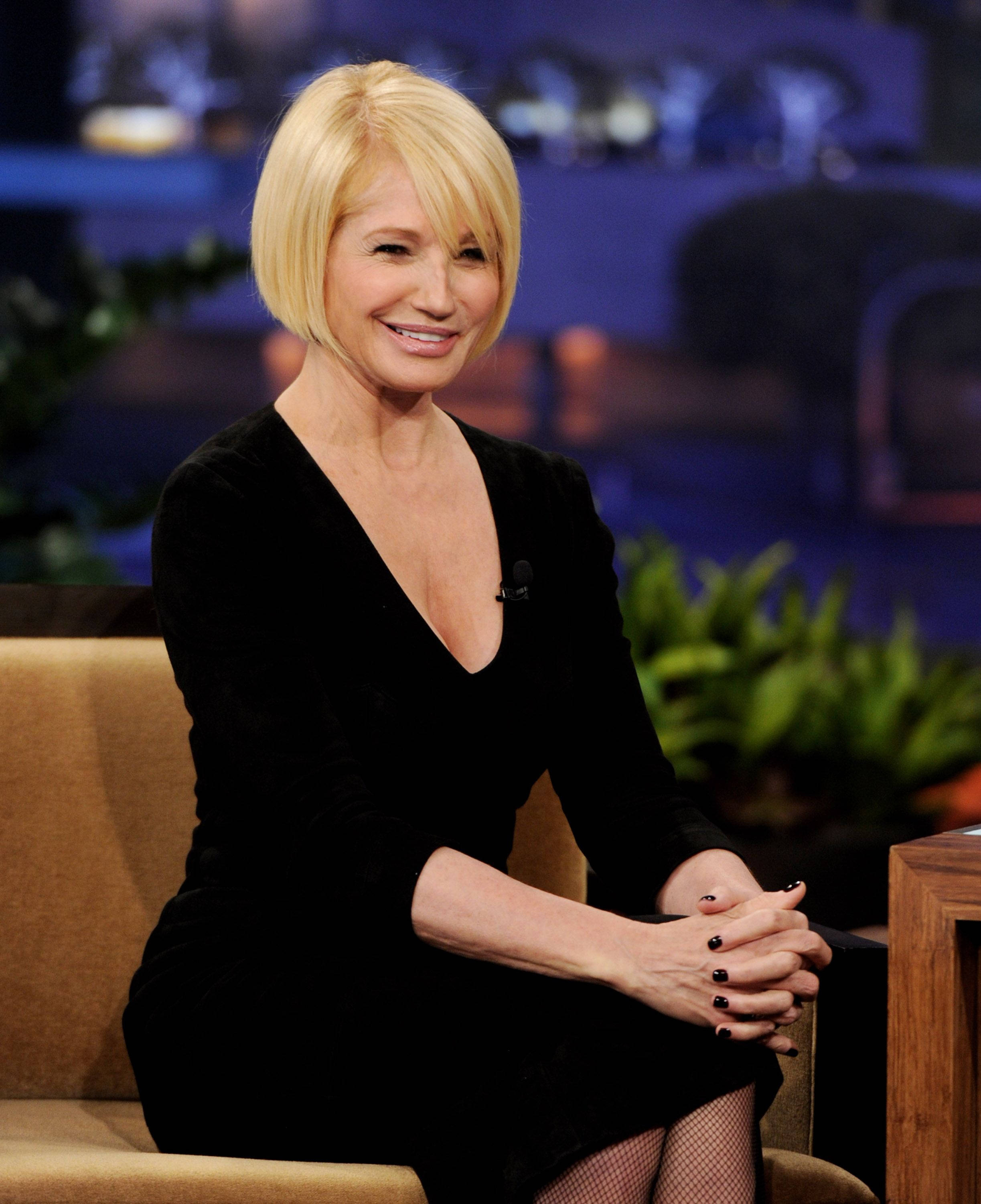 Ellen Barkin, black velvet dress, tan couch, 2K Phone Wallpaper