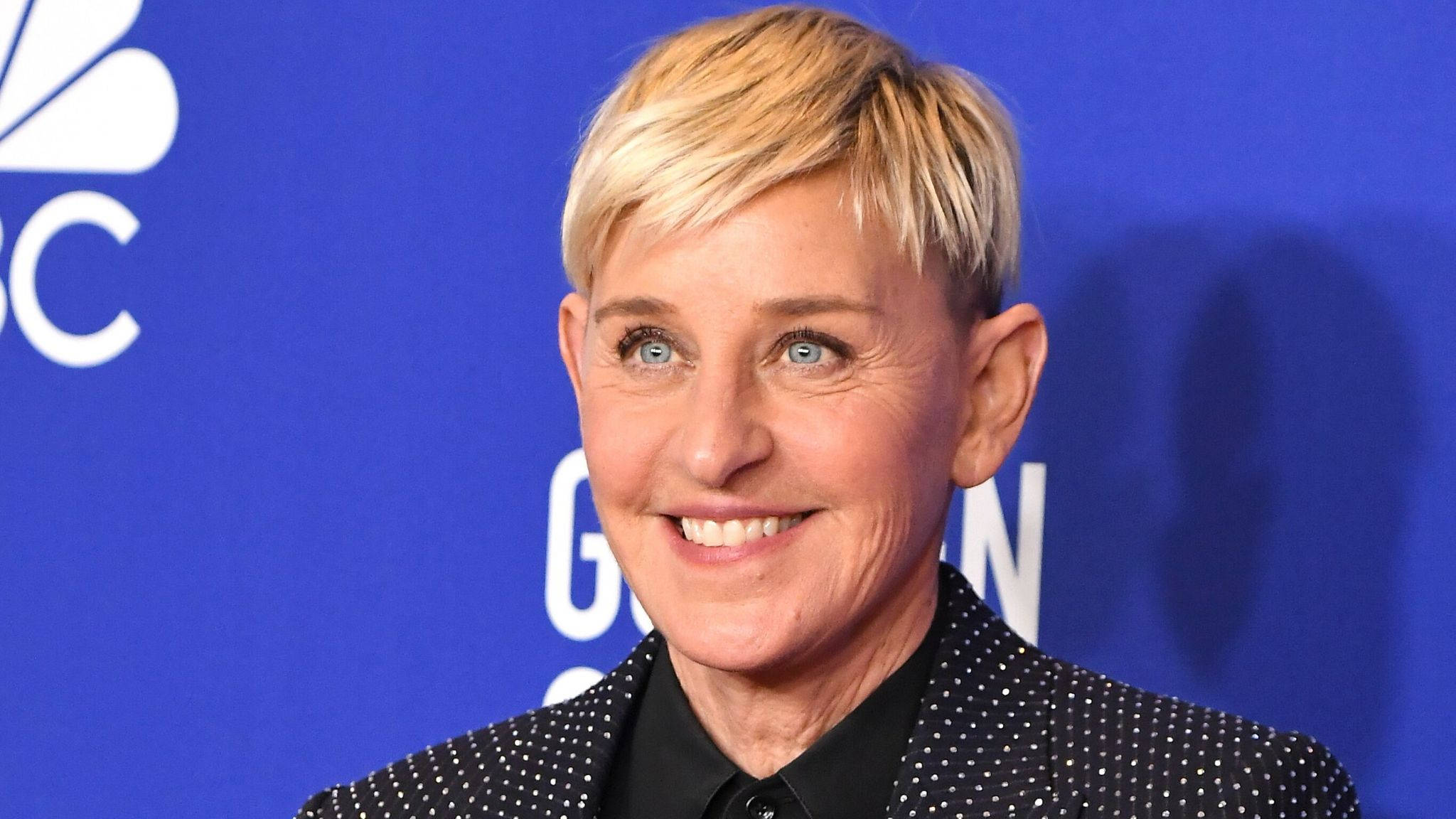 Ellen Degeneres, black polka-dot blazer, blue NBC backdrop, Full HD Desktop Wallpaper