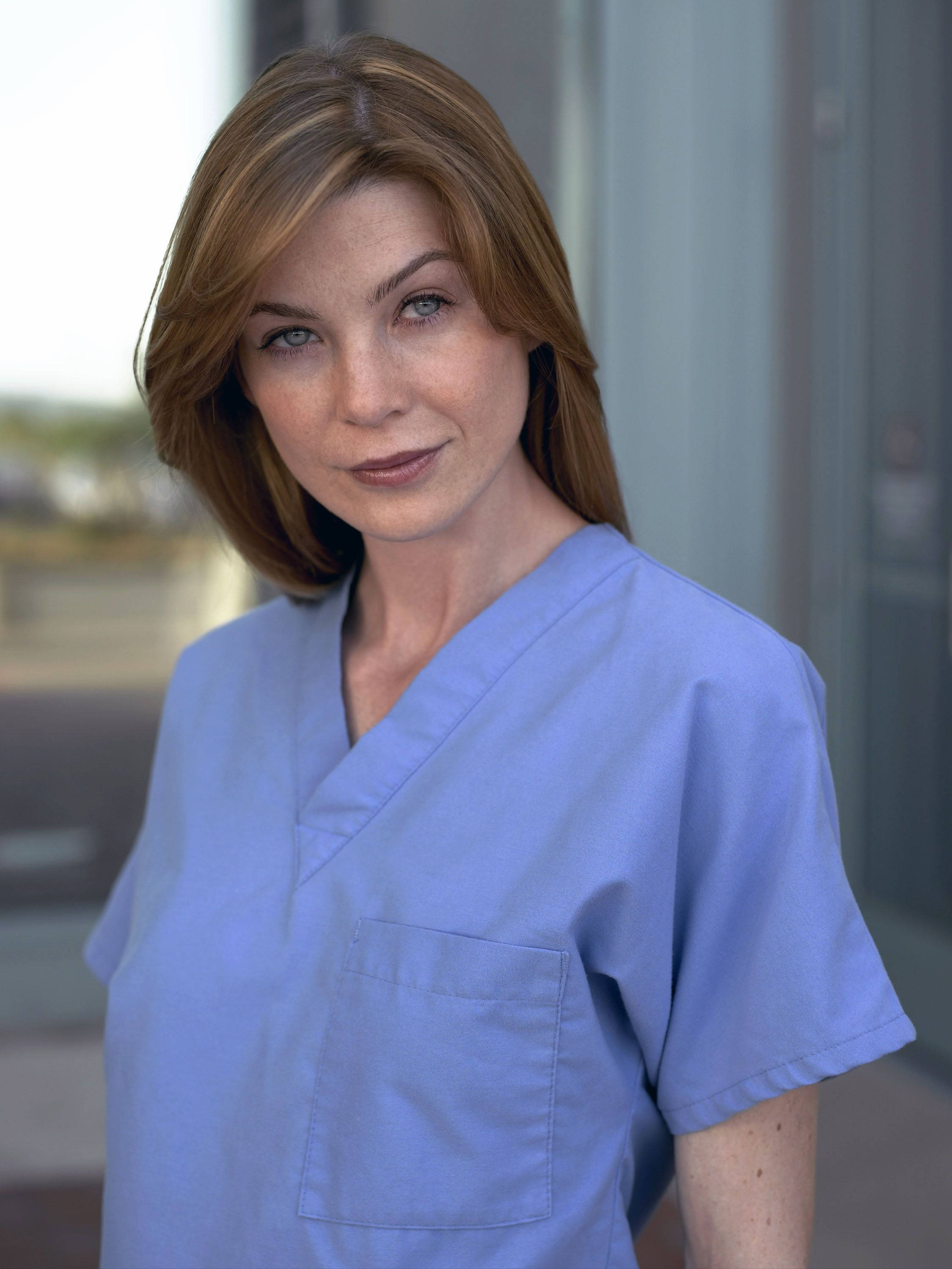Ellen Pompeo, light blue medical scrubs, shallow focus, 2K Phone Wallpaper