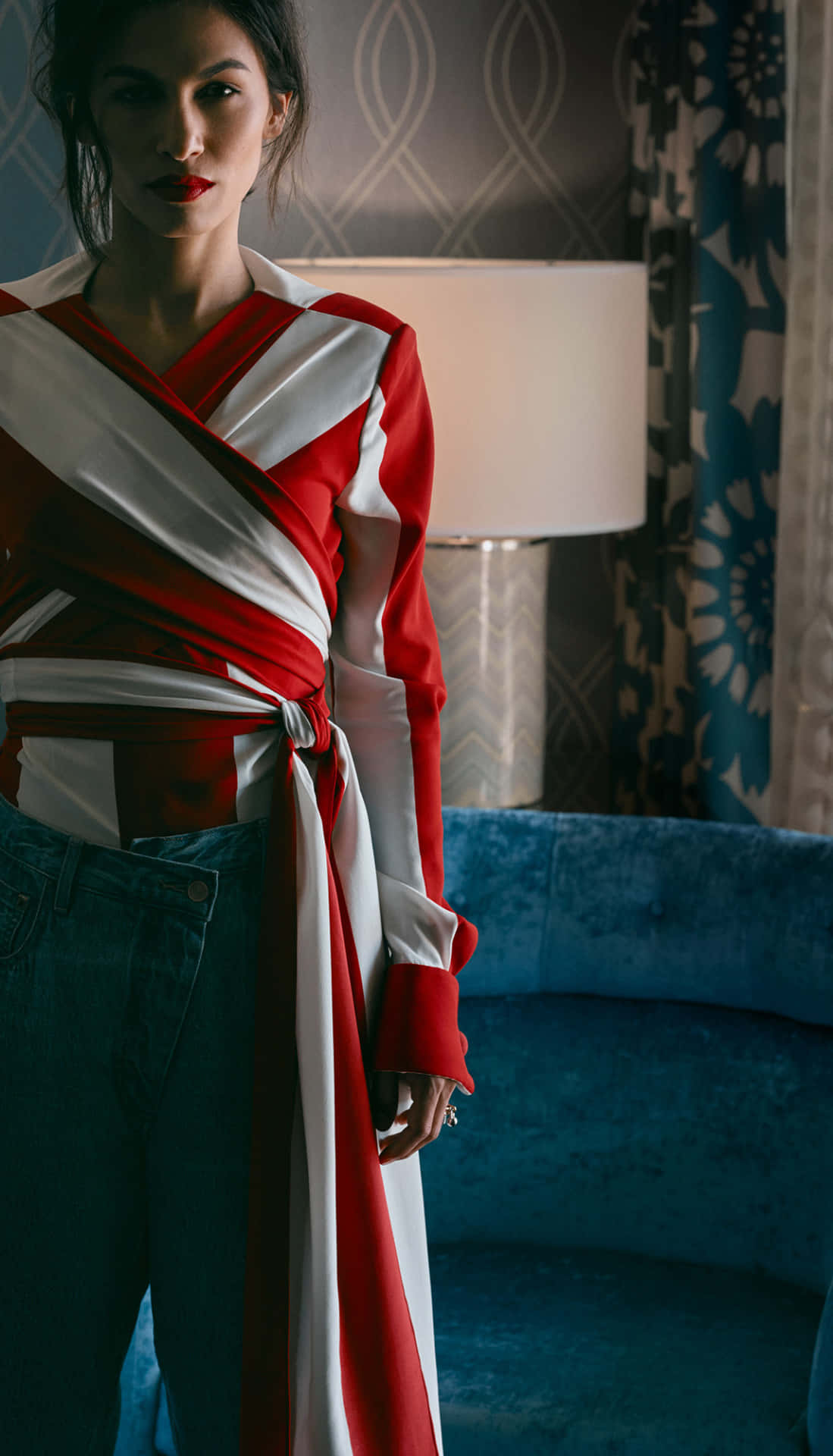 Elodie Yung, red and white striped dress, blue velvet couch, Full HD Phone Wallpaper