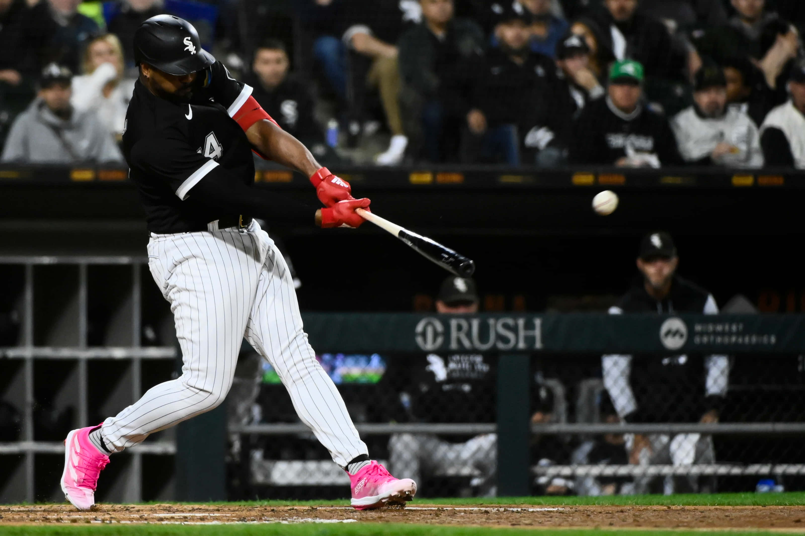 Eloy Jimenez, black and white pinstripe uniform, bright pink cleats, 2K Desktop Wallpaper