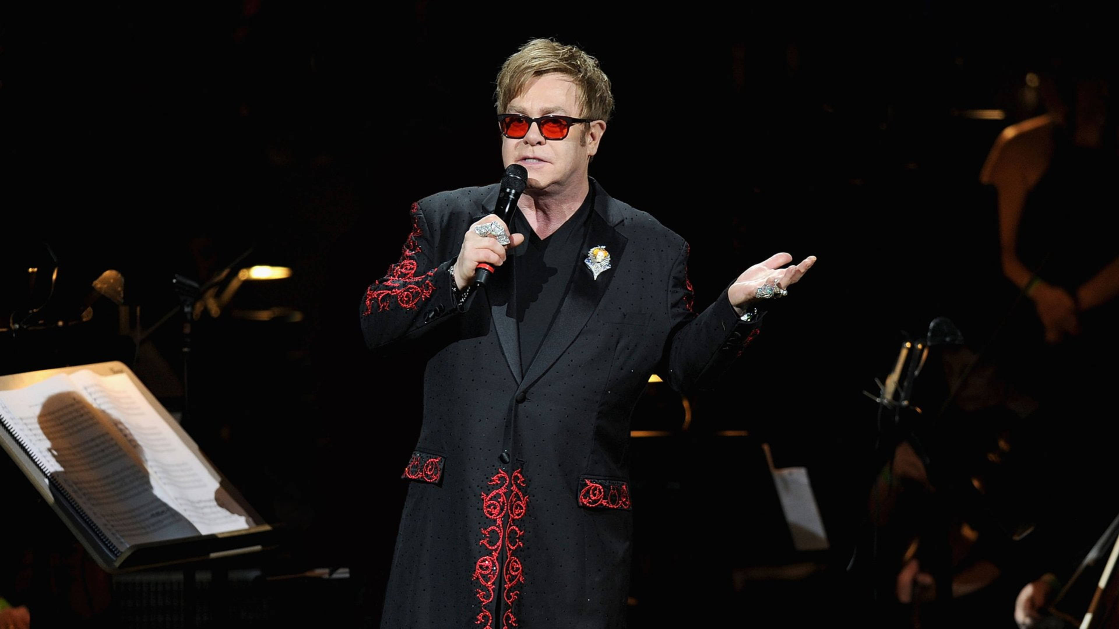 Elton John, black suit, red embroidery, 4K Desktop Wallpaper
