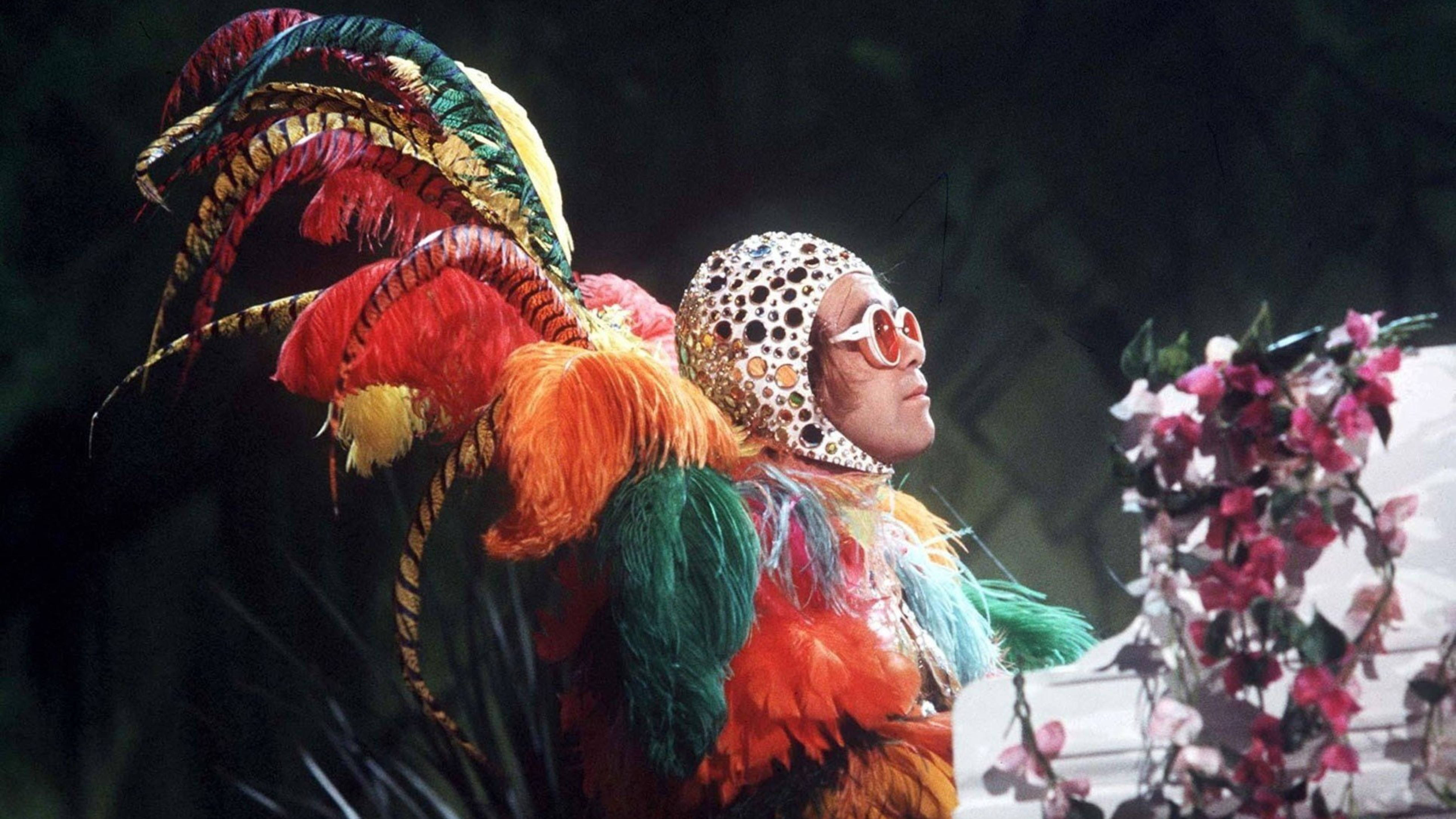 Elton John, peacock suit, vibrant feathered costume, 5K Desktop Wallpaper