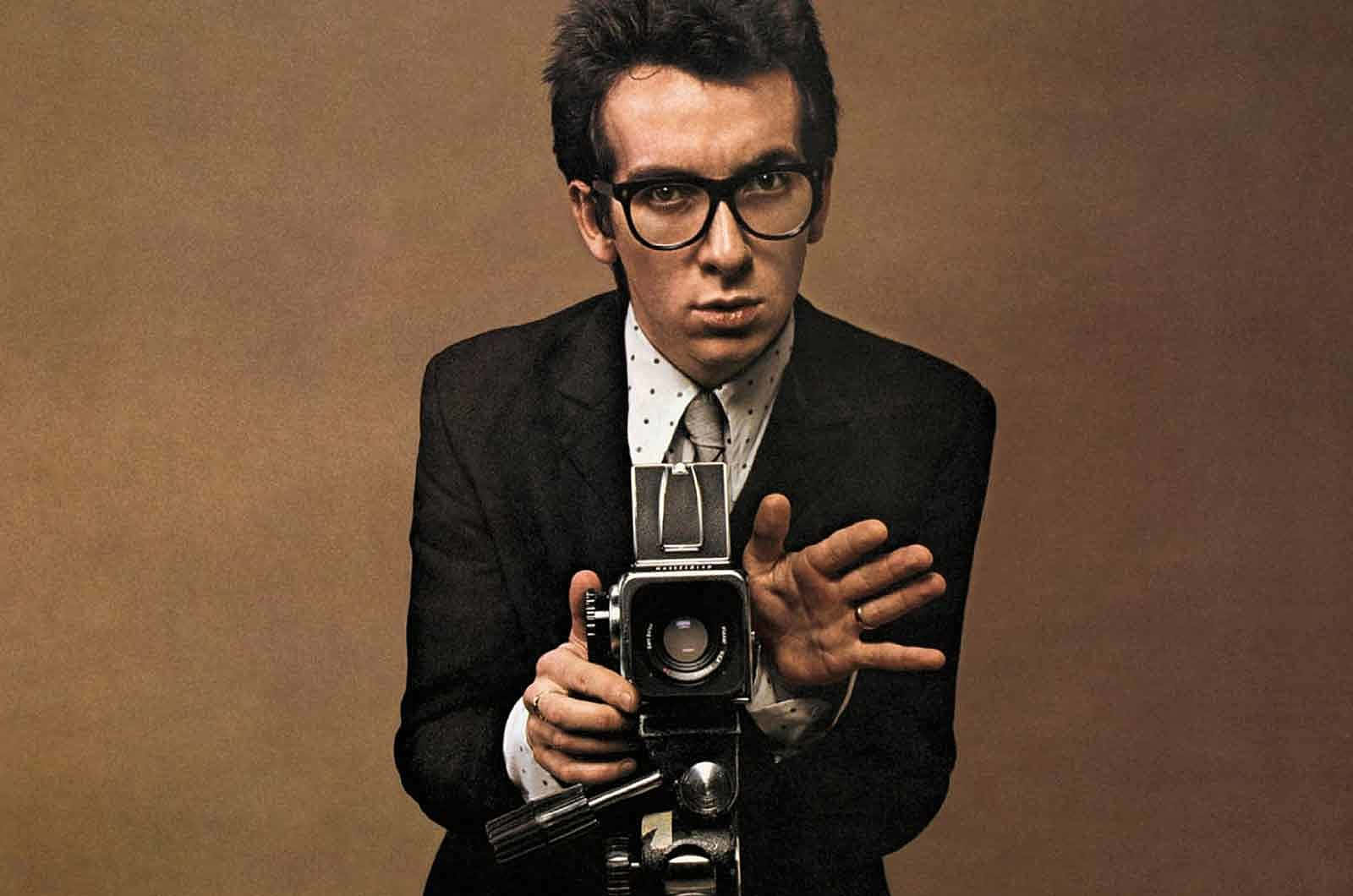 Elvis Costello, vintage camera, dark suit, HD Desktop Wallpaper