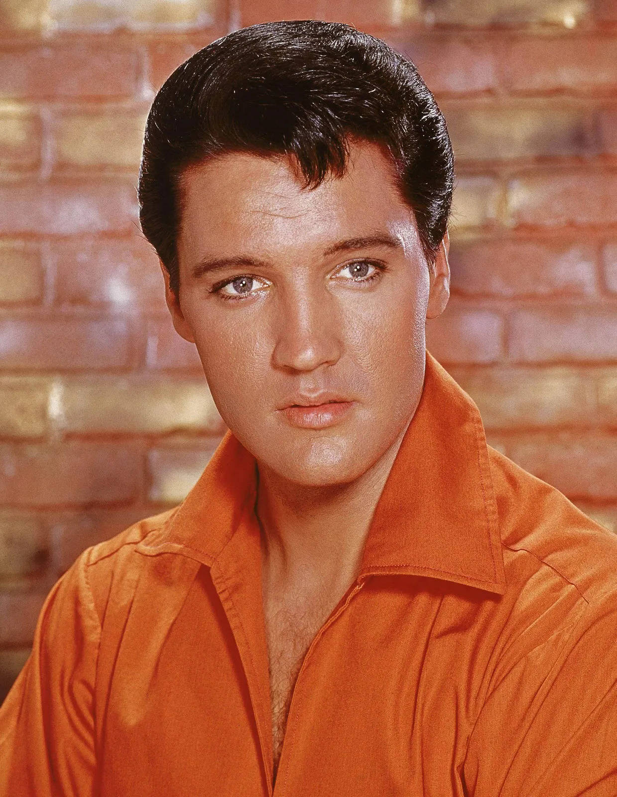 Elvis Presley, orange shirt, warm brick wall, HD Phone Wallpaper