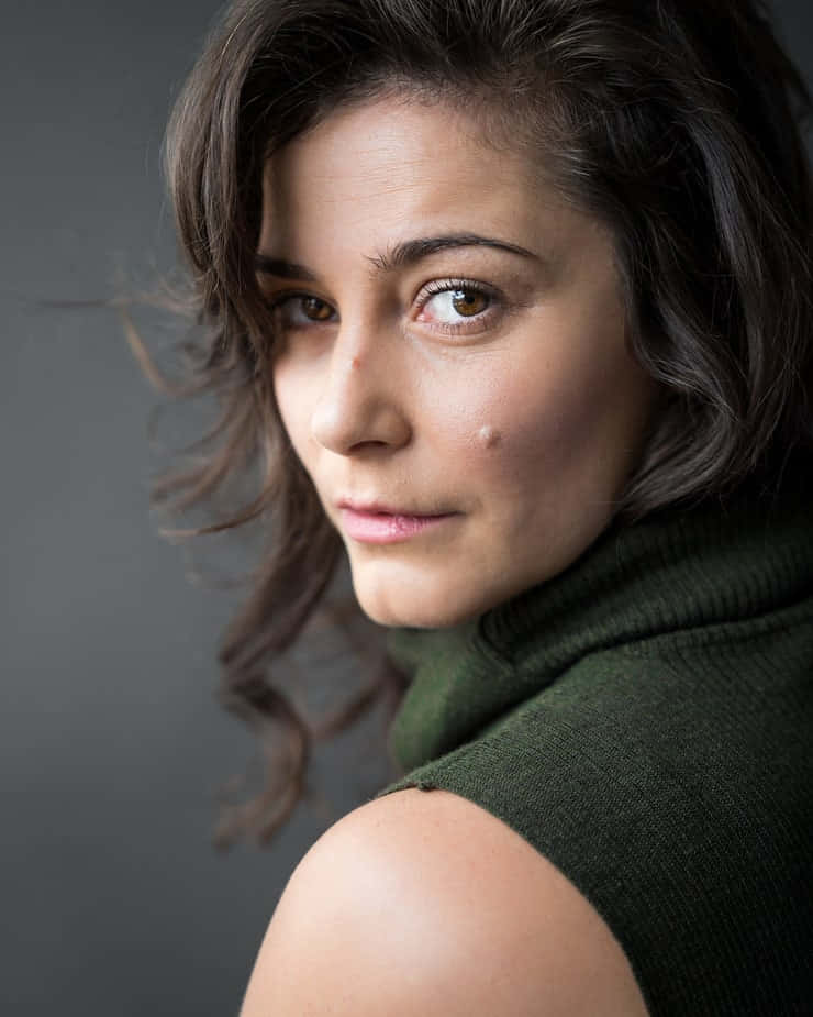 Elysia Rotaru, green turtleneck, dark wavy hair, SD Phone Wallpaper