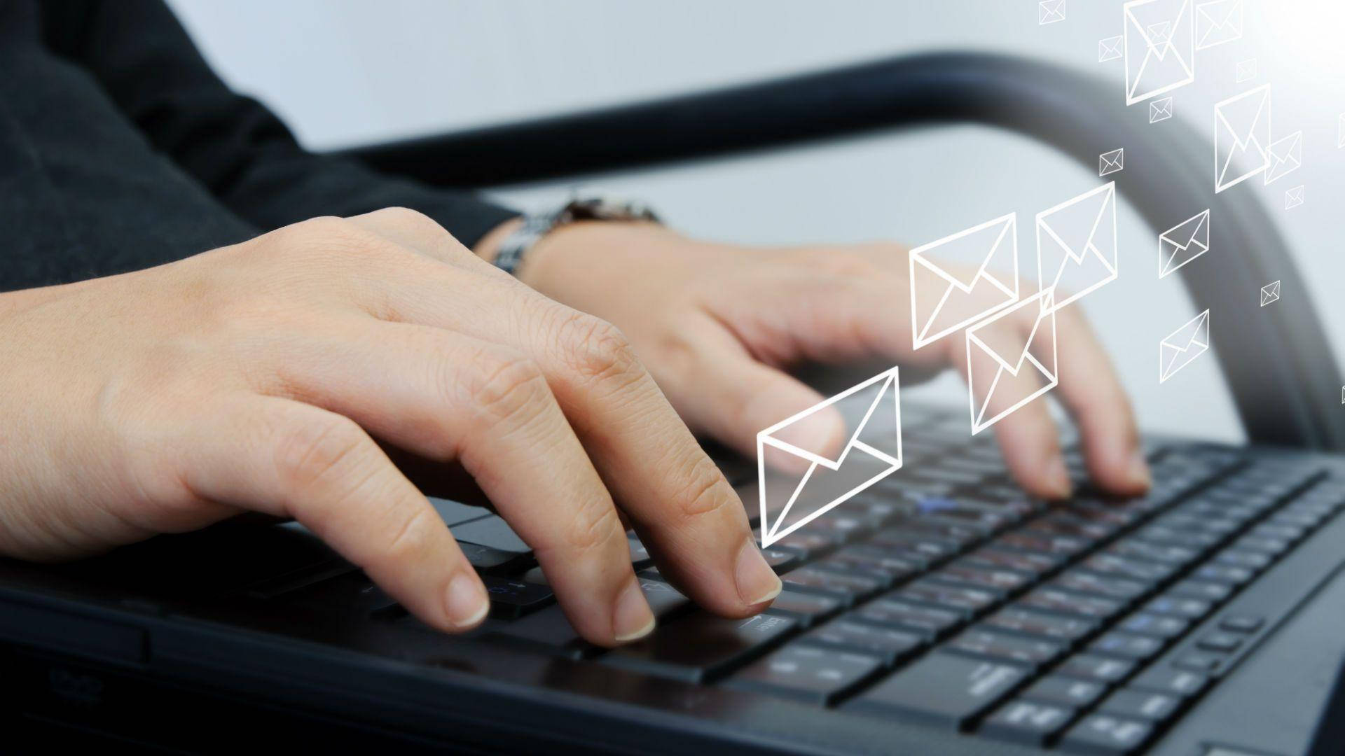 laptop keyboard, floating email icons, hands typing, Full HD Desktop Wallpaper