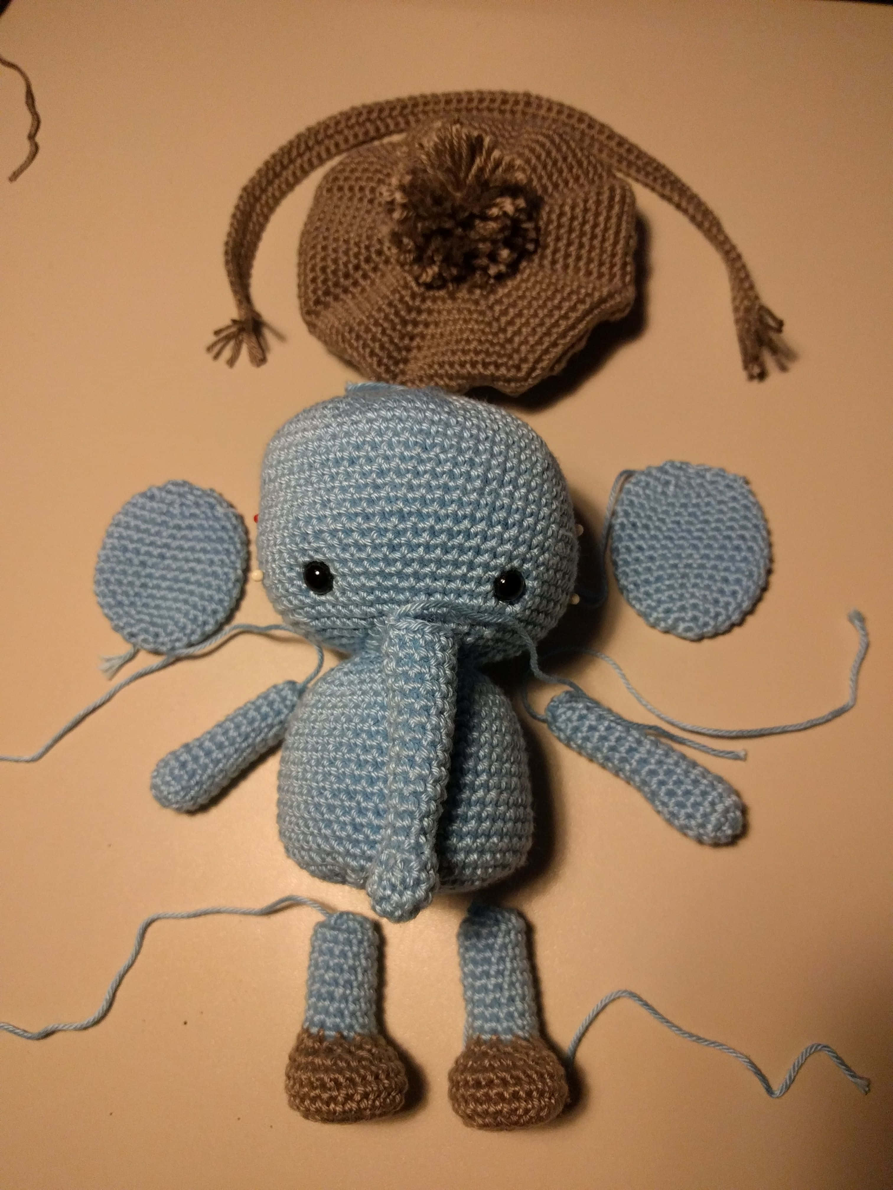 Emily Elephant, light blue crocheted elephant toy, brown feet, 4K Phone Wallpaper