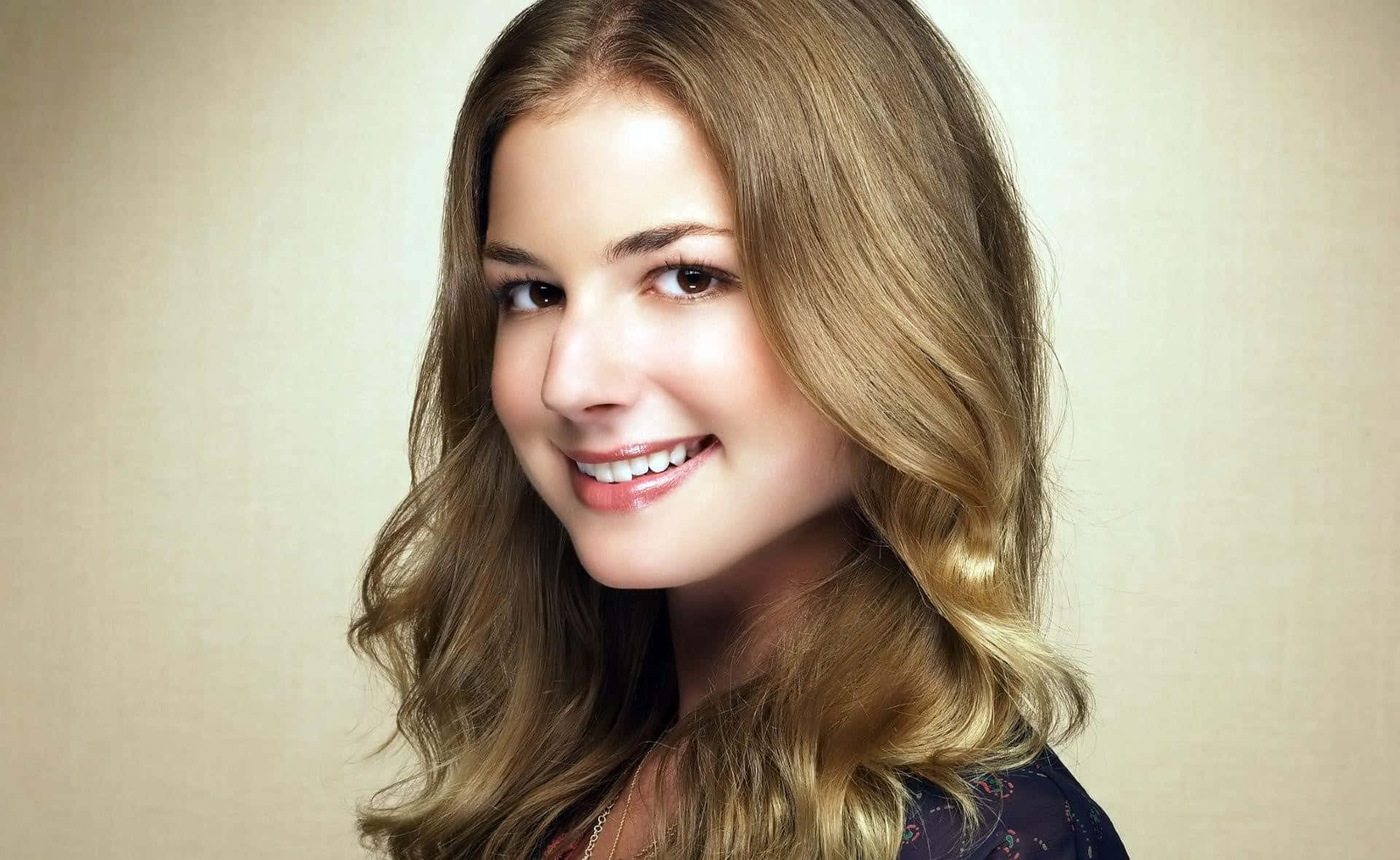 Emily Vancamp, wavy blonde hair, soft beige studio background, Full HD Desktop Wallpaper