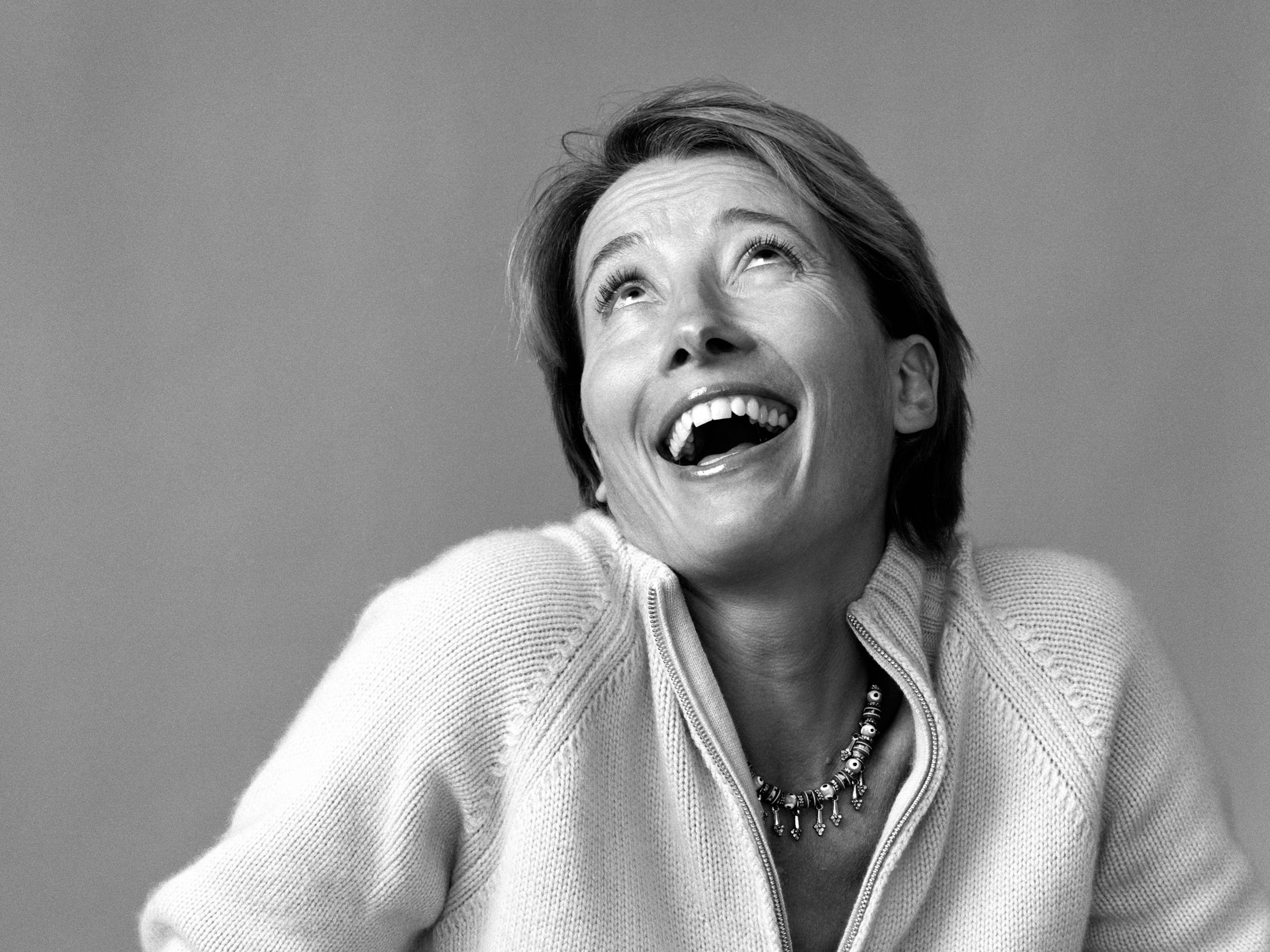 Emma Thompson, black and white portrait, plain gray background, 2K Desktop Wallpaper