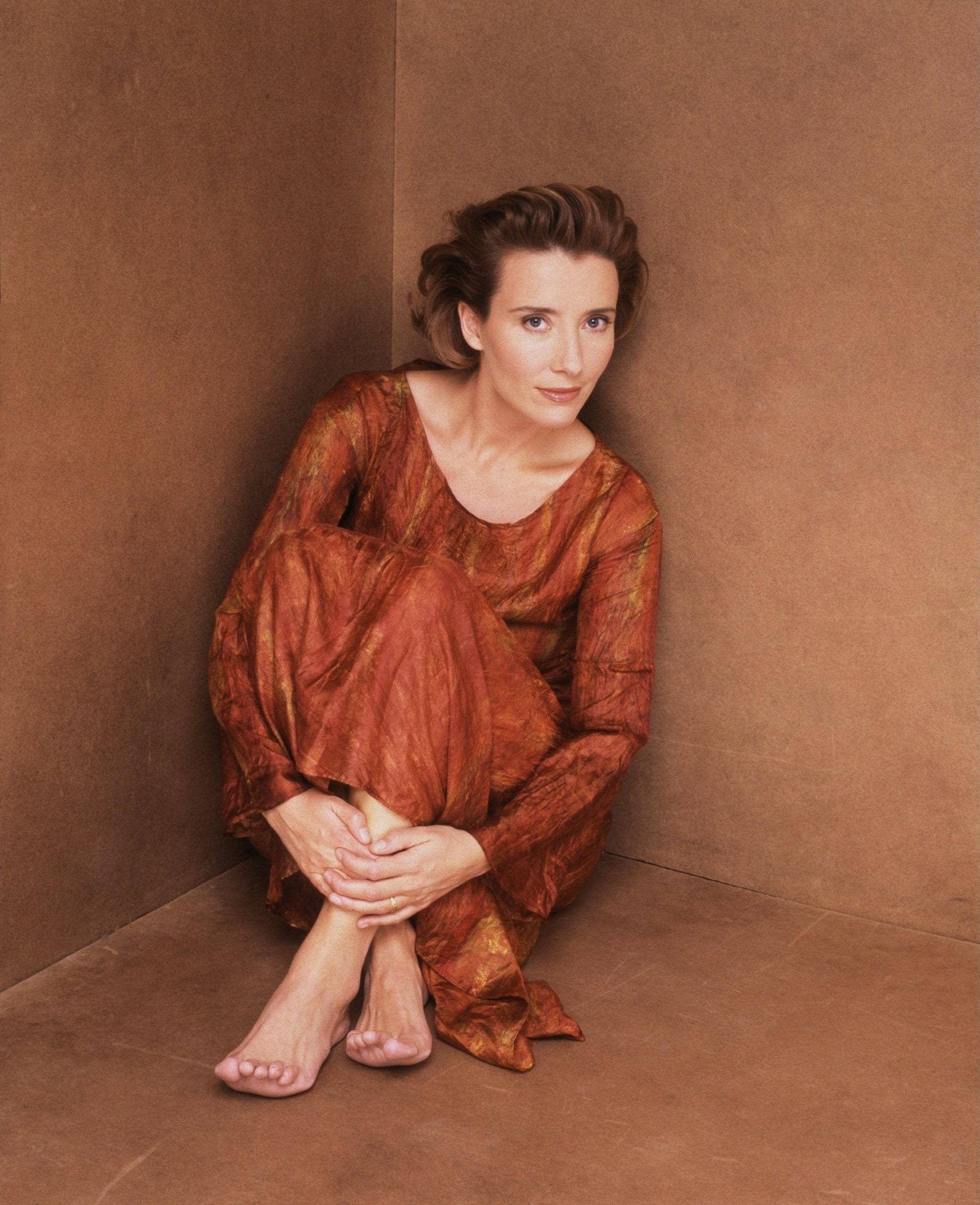 Emma Thompson, rust-colored dress, monochromatic brown room, 2K Phone Wallpaper