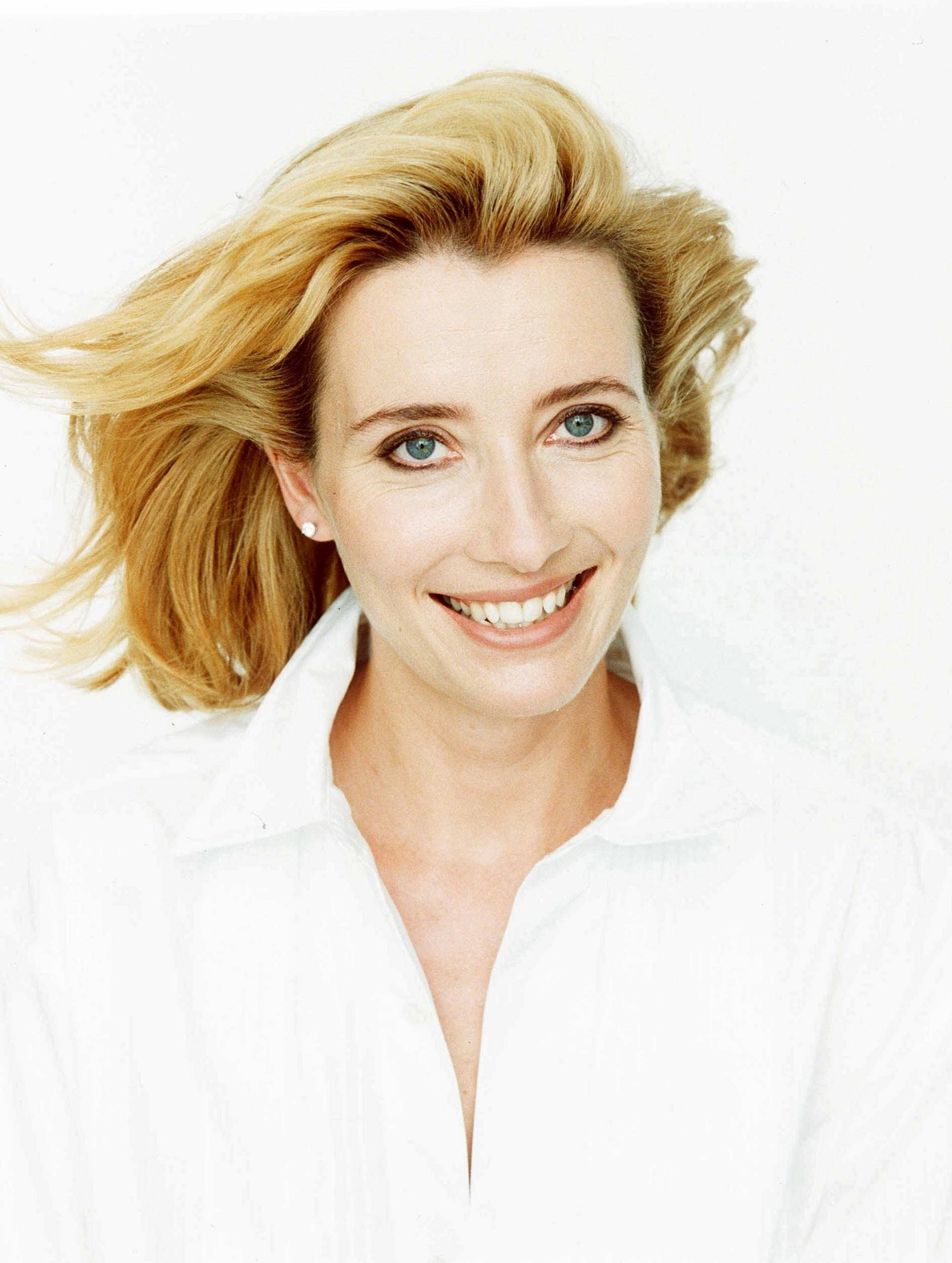 Emma Thompson, blonde hair, blue eyes, 2K Phone Wallpaper