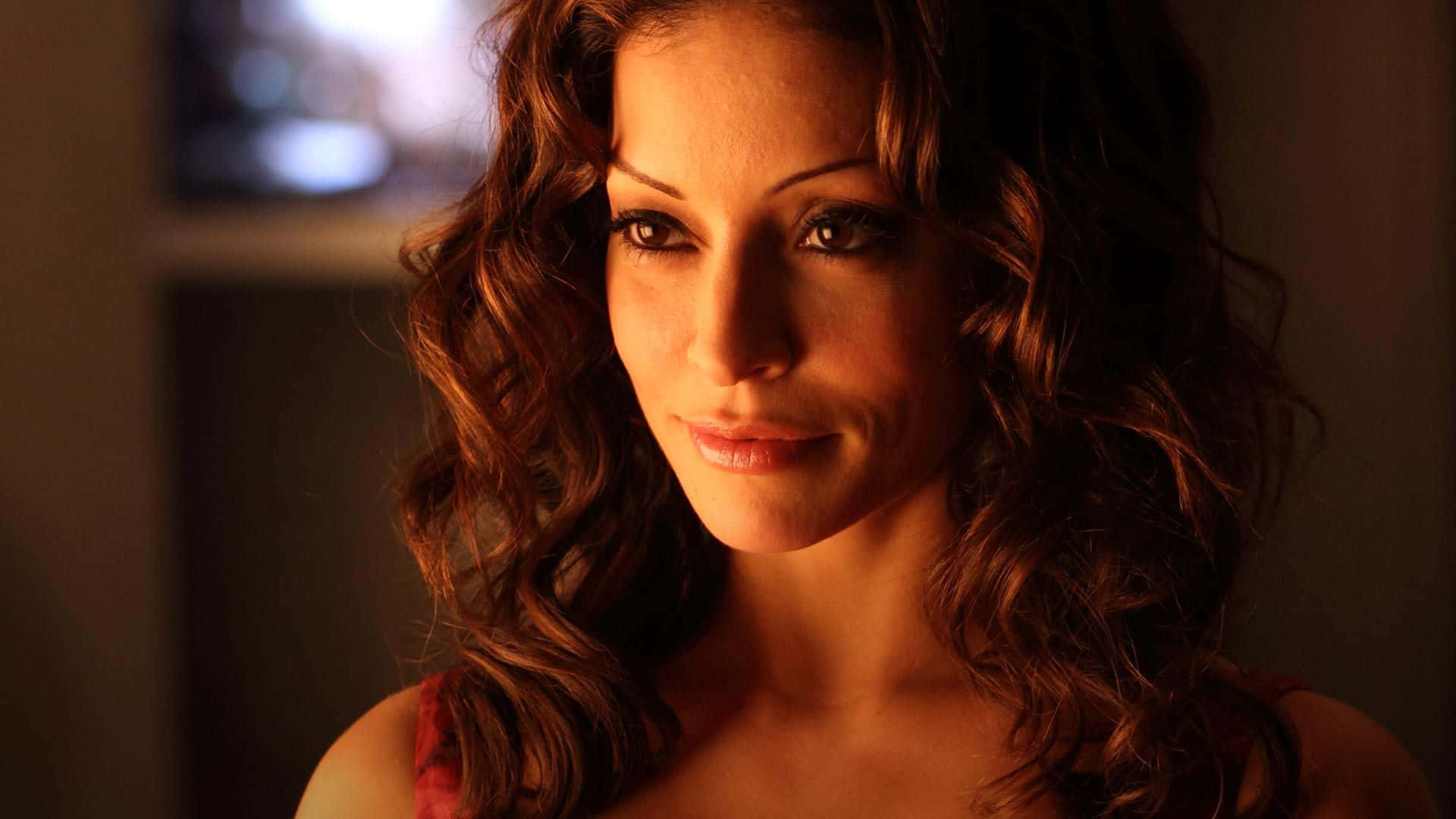 Emmanuelle Vaugier, curly brown hair, warm golden lighting, Full HD Desktop Wallpaper
