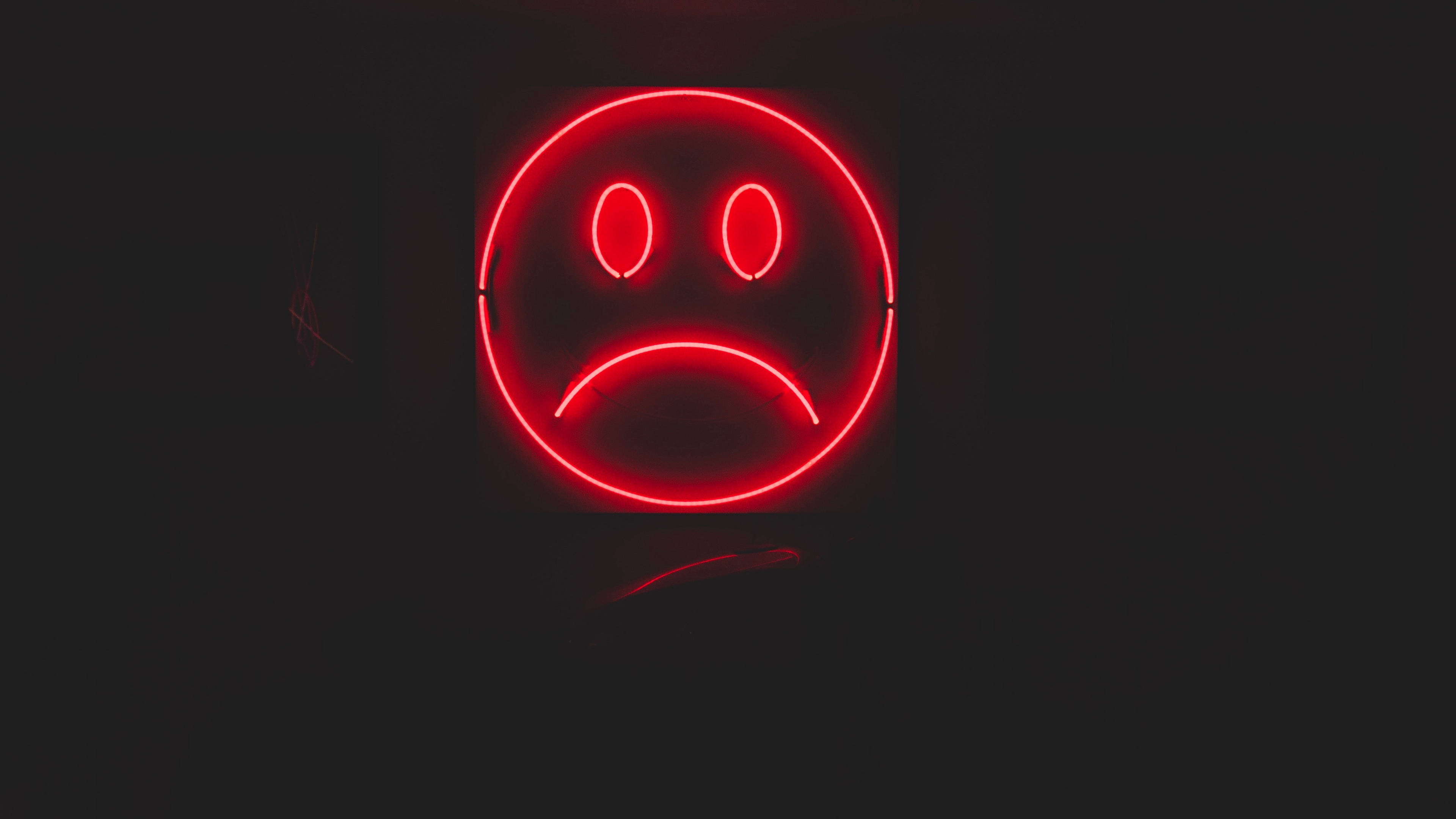neon red emo face, glowing red neon, sad face sign, 4K Desktop Wallpaper
