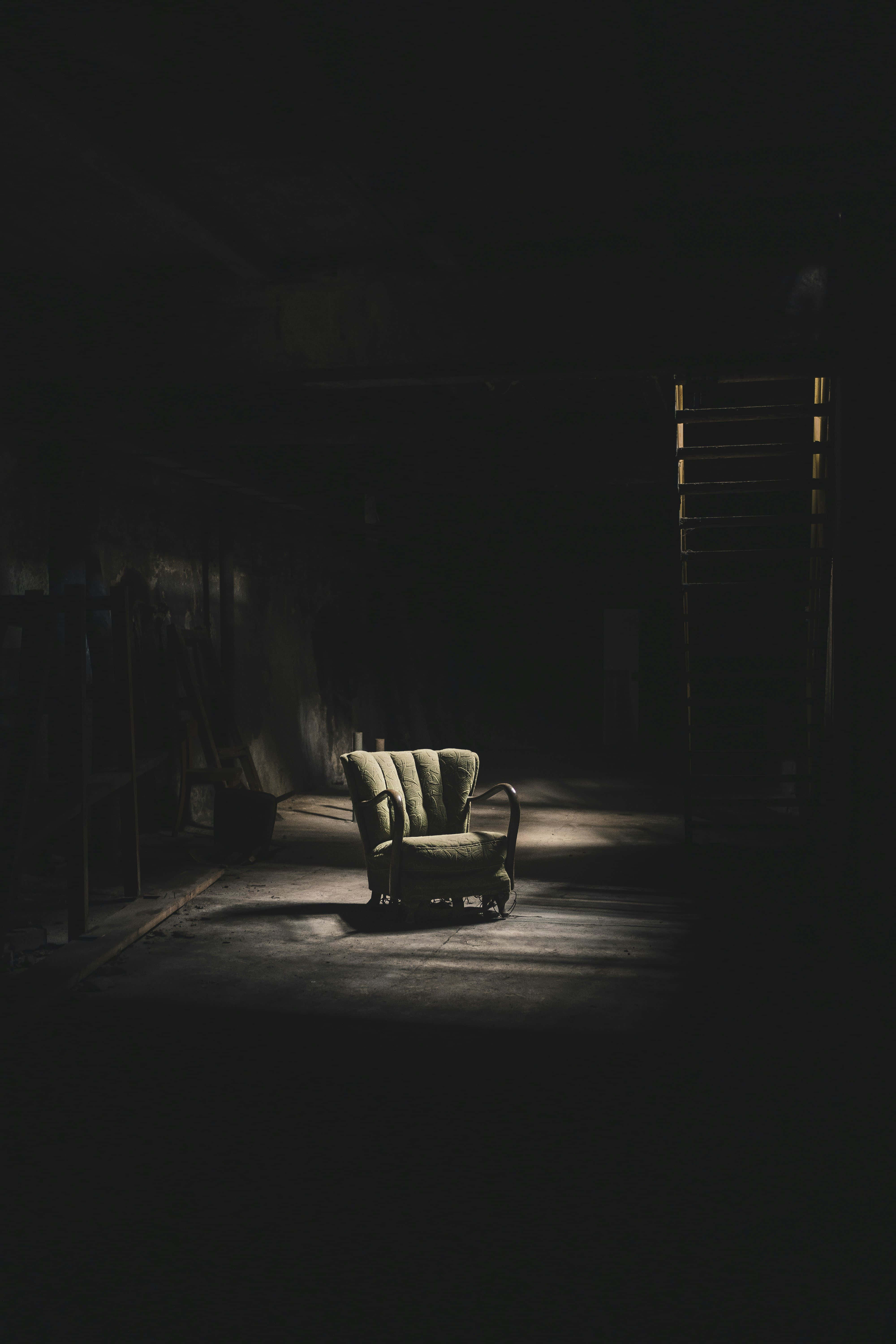 Abandoned Comfort, liminal space, green armchair, 5K Phone Wallpaper