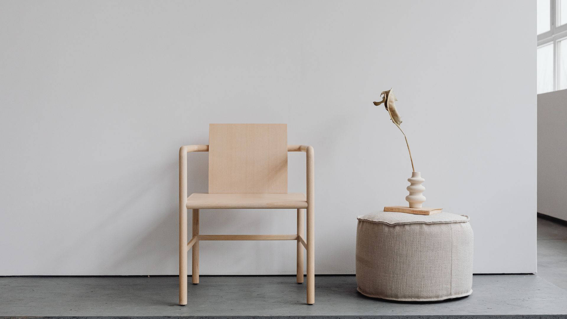 minimalist wooden chair, textured ottoman, sculptural vase, Full HD Desktop Wallpaper