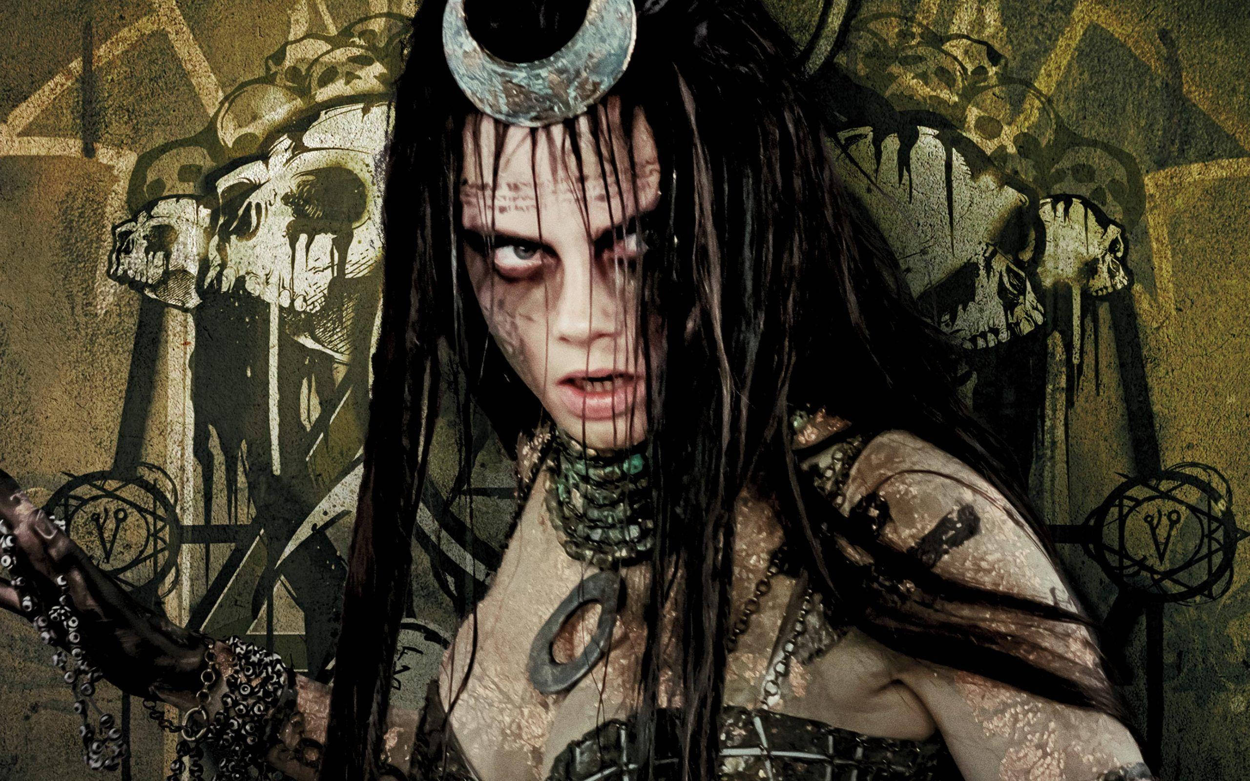 Enchantress, skull-adorned backdrop, crescent moon headpiece, 2K Desktop Wallpaper