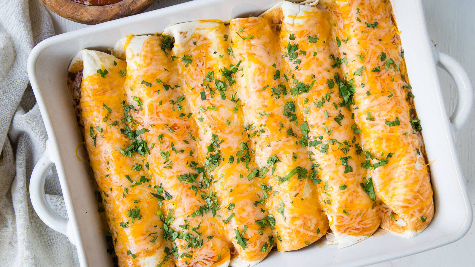 enchiladas, white ceramic baking dish, golden cheese-topped, HD Desktop Wallpaper