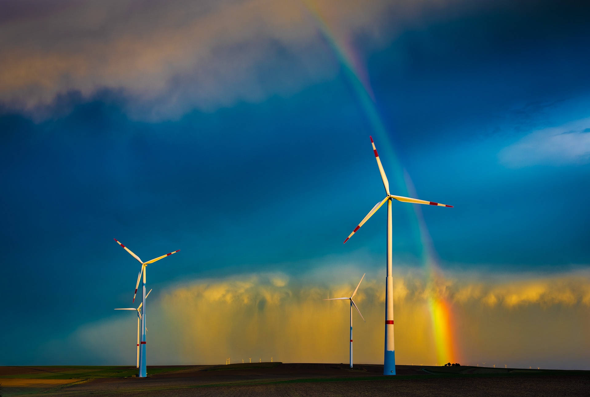 Wind turbines, vivid rainbow, storm clouds, Full HD Desktop Wallpaper