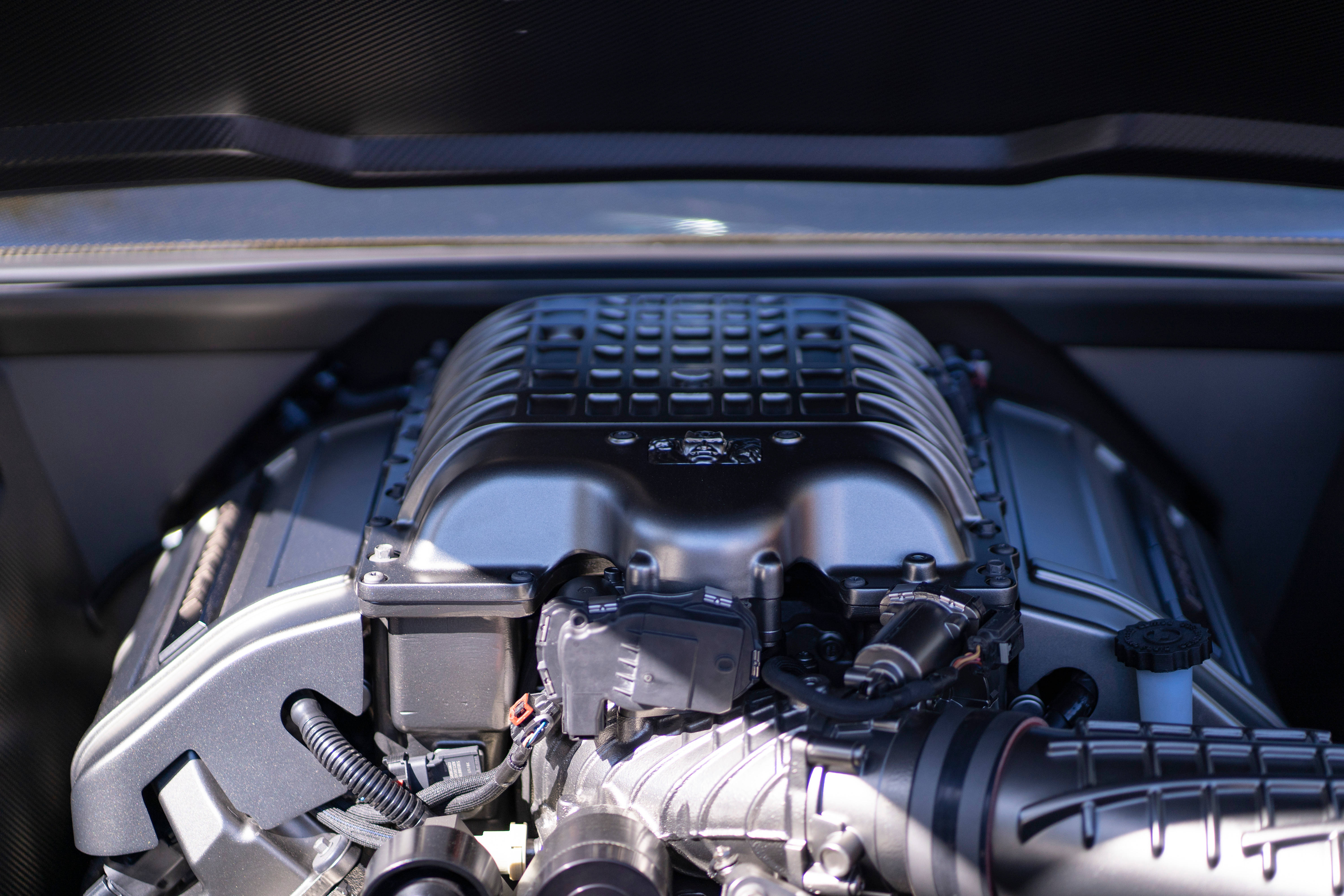 black and silver car engine, polished metal components, carbon fiber accents, 5K Desktop Wallpaper
