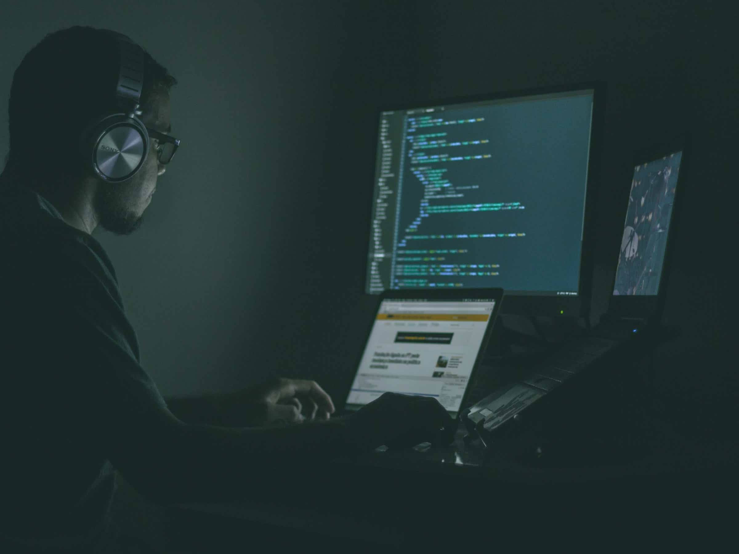 software engineer, headphones, dimly lit desk, Full HD Desktop Wallpaper