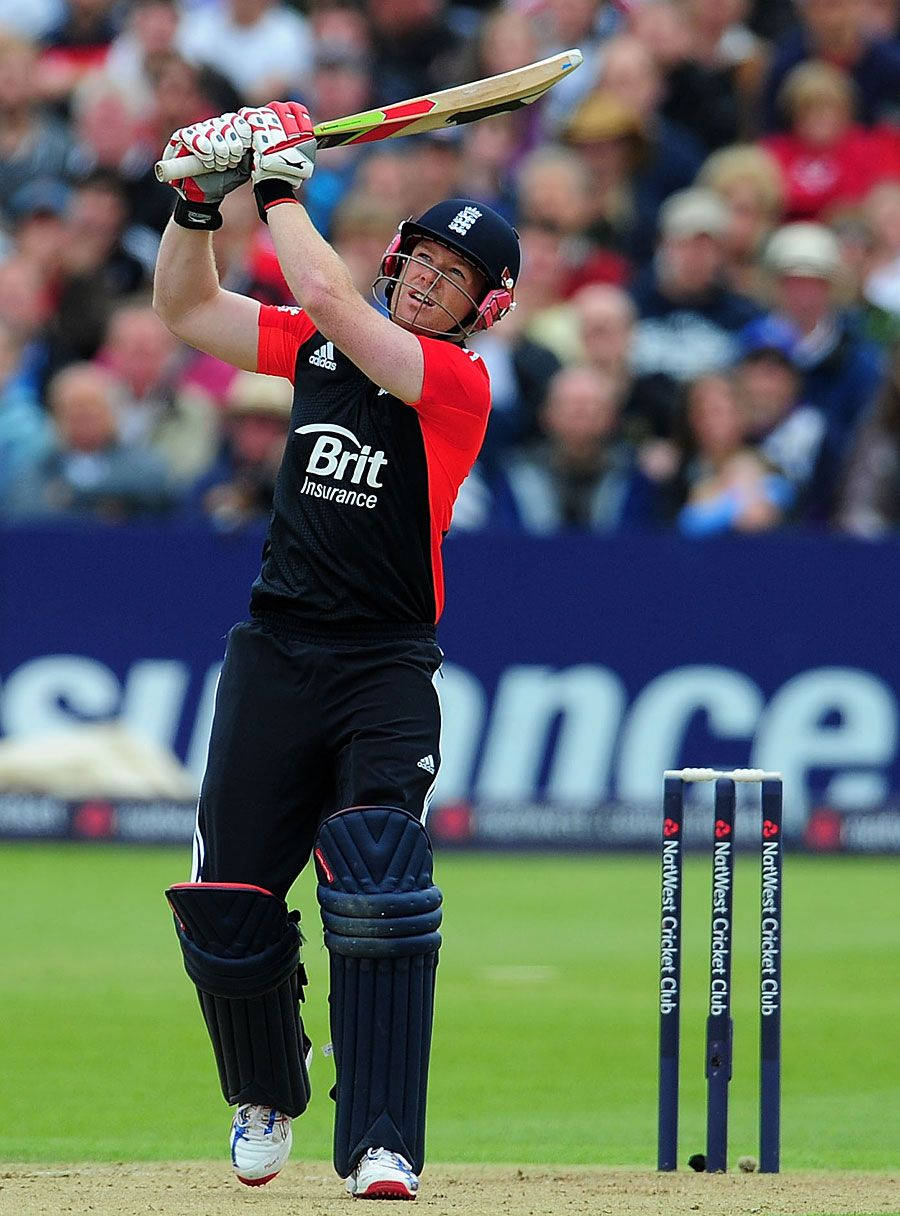 Eoin Morgan, cricket batsman, red and black uniform, SD Phone Wallpaper
