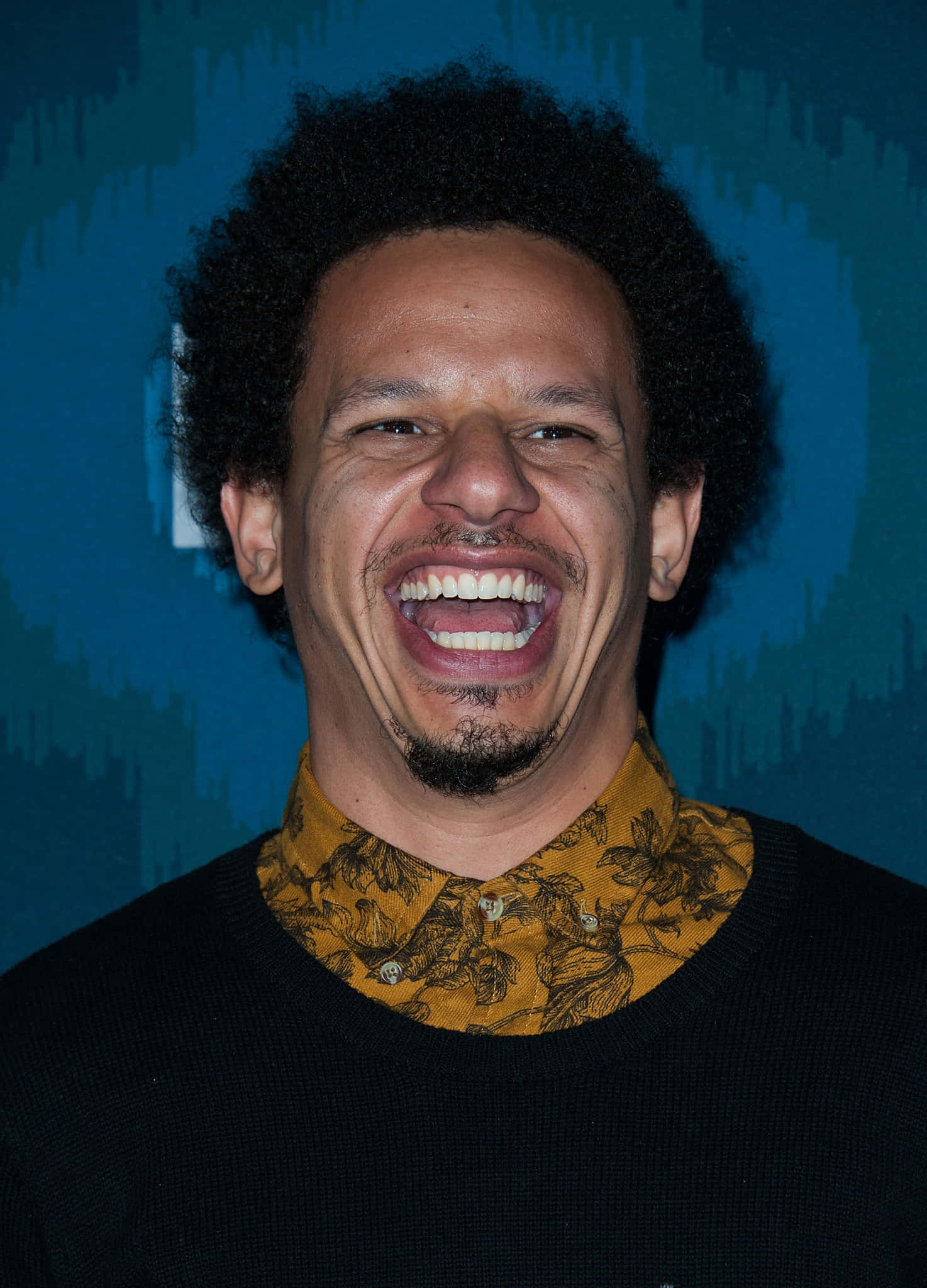 Eric Andre, curly black hair, textured blue wall, Full HD Phone Wallpaper