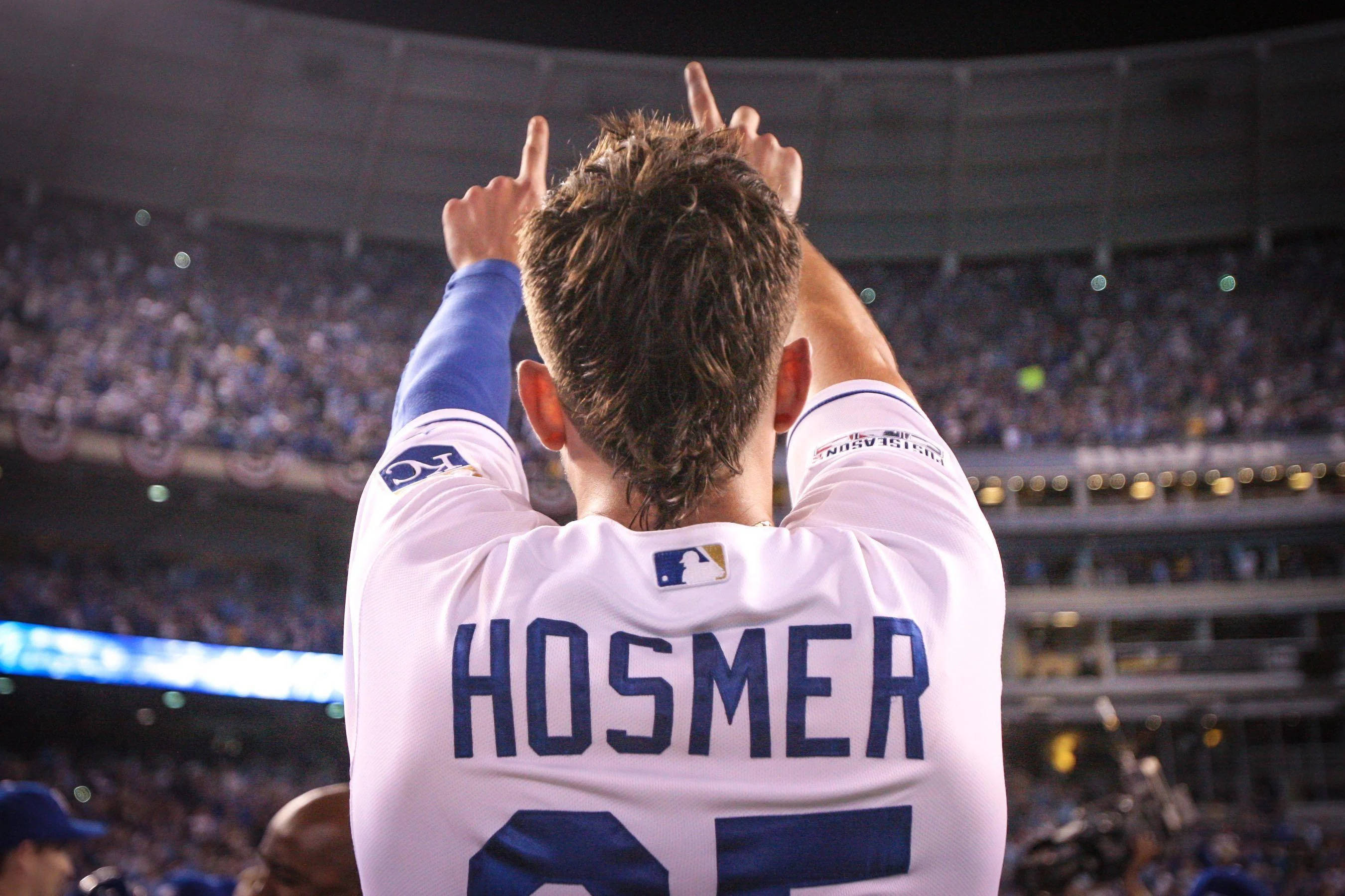 Eric Hosmer, white jersey, index fingers pointing upward, 2K Desktop Wallpaper